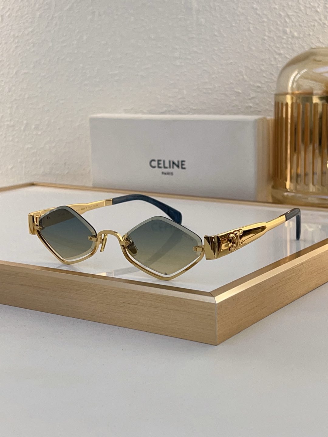 Celine Geometric Gold - Tone Metal Sunglasses with Triomphe & Blue Accents (Model: CL4134)