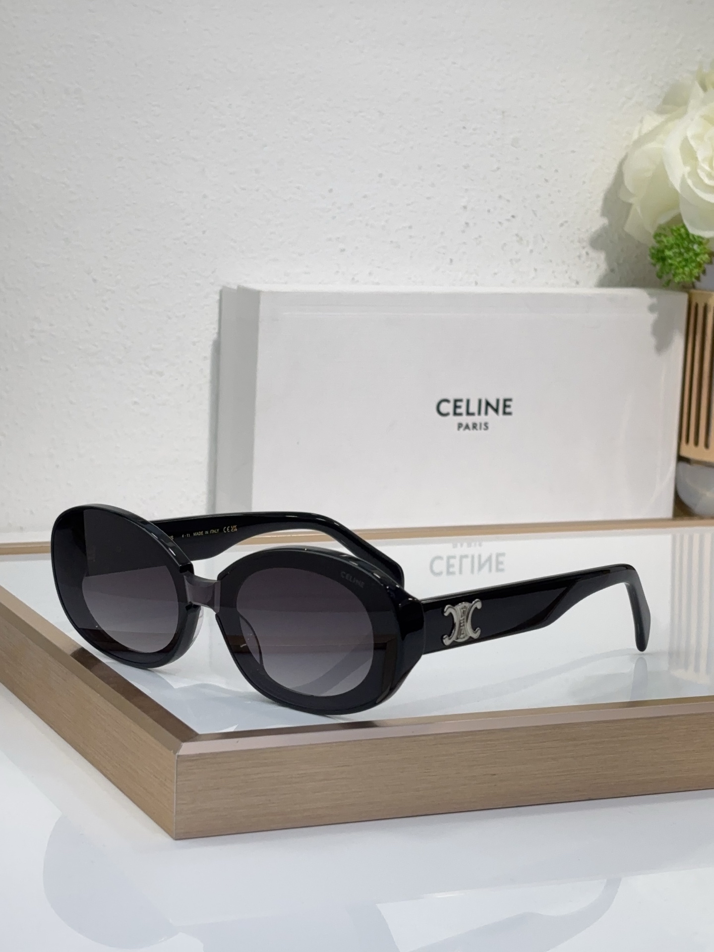 Celine Oval Black Acetate Sunglasses with Gold Triomphe Accent (Model: CL4126)
