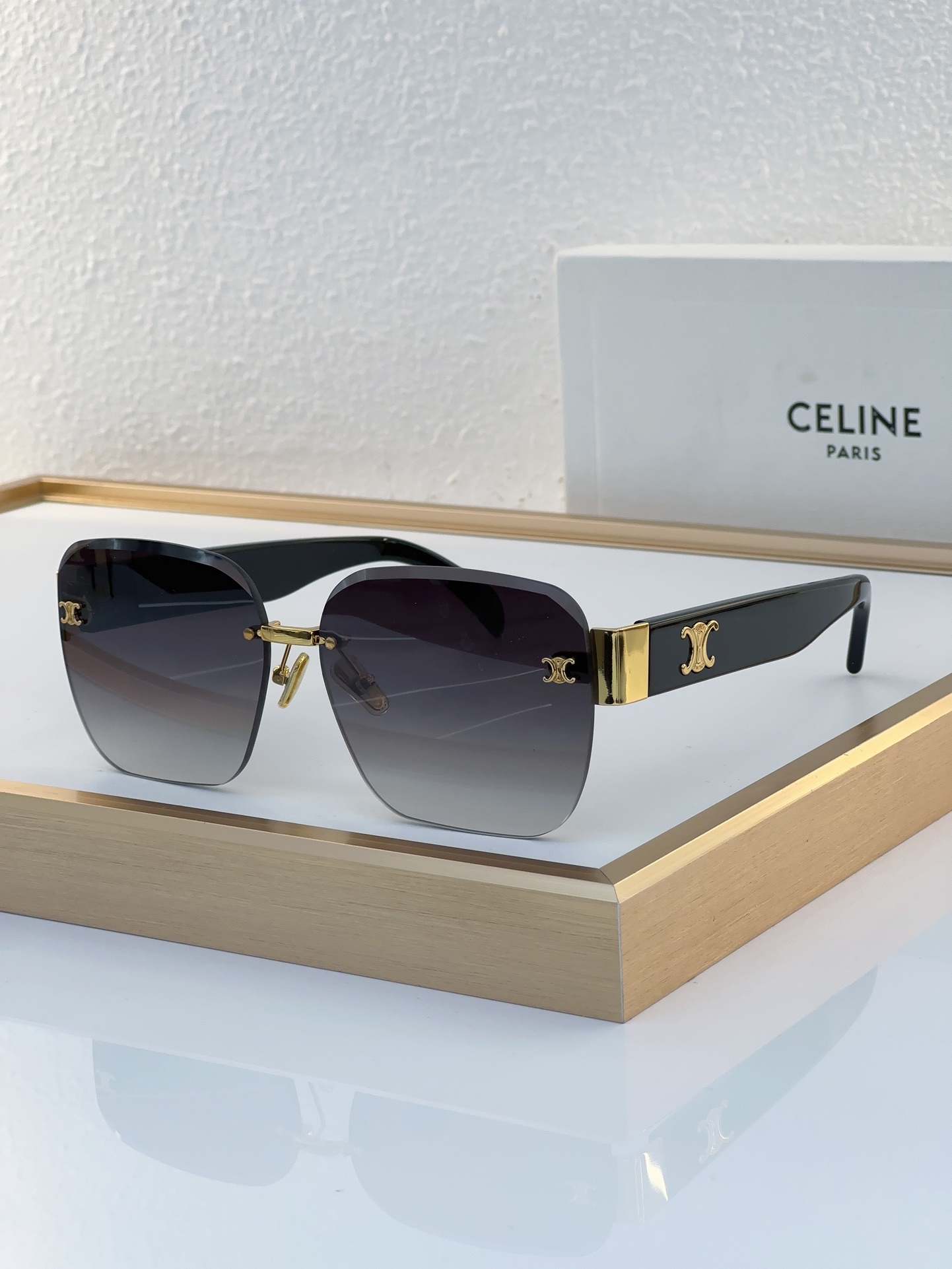 Celine Rimless Square Sunglasses with Gold Triomphe Accents (Model: CL4036)