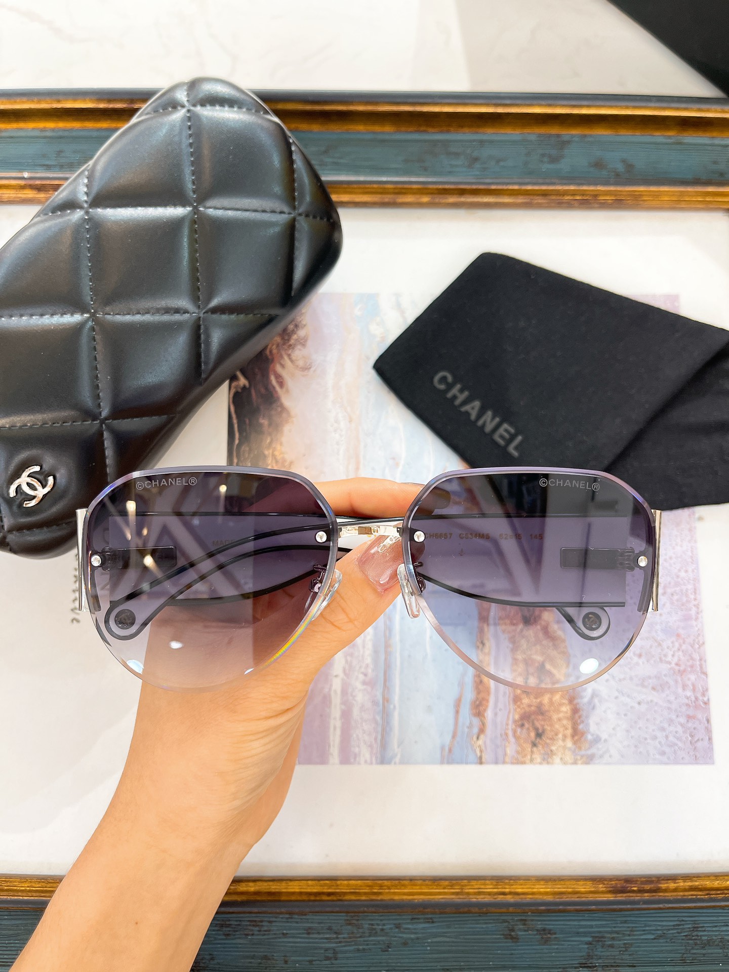 Chanel Hexagonal Rimless Sunglasses with Gold Metal & Amber Gradient Lenses (Model: CH4293)