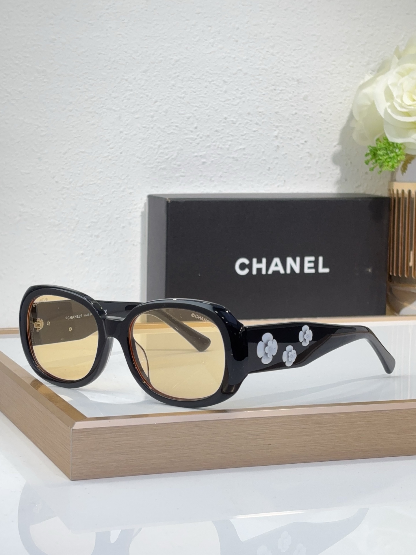 Chanel Black Acetate Oval Sunglasses with Camellia - Inspired Floral Motifs (Model: CH5618)