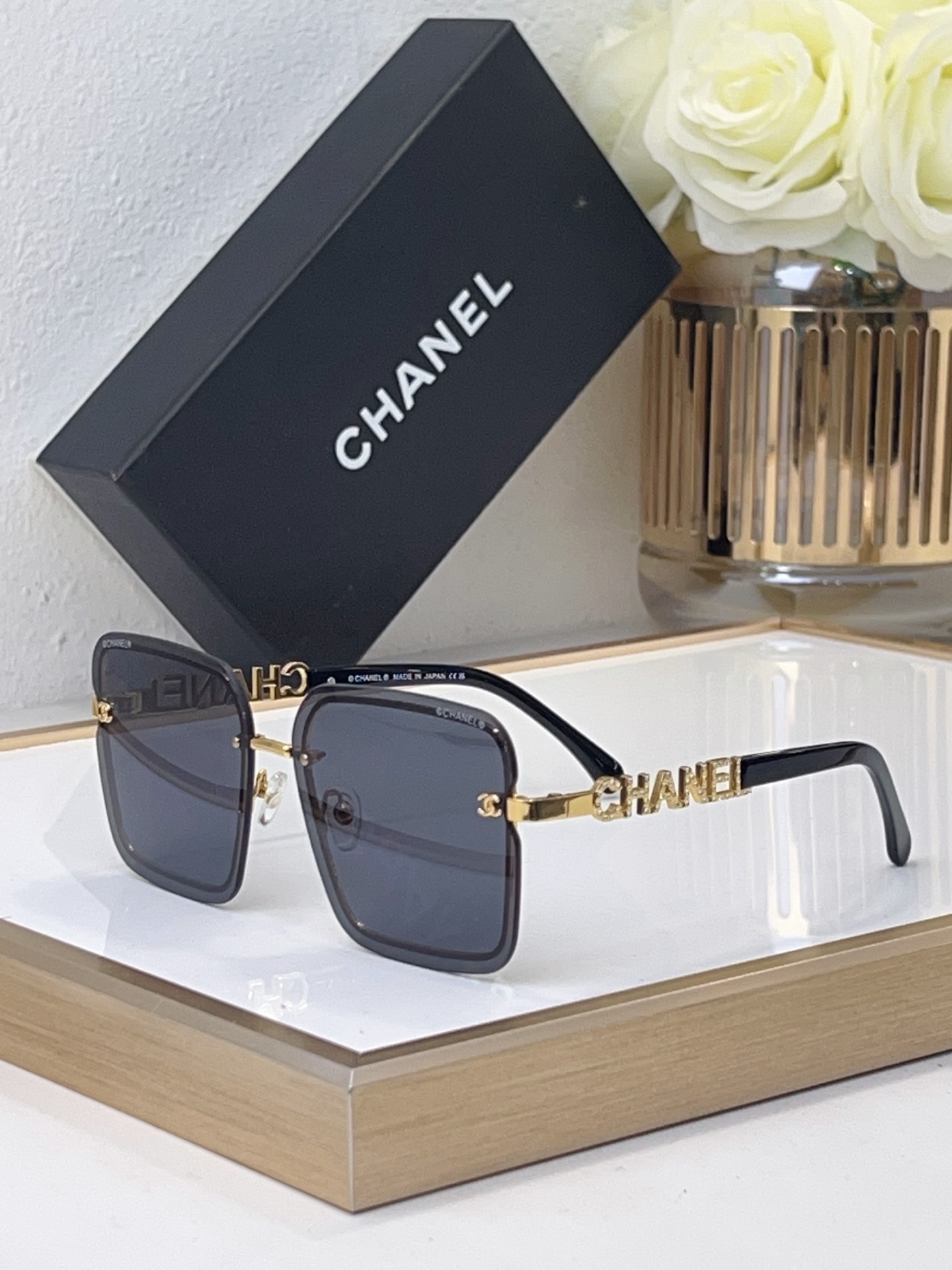 Chanel Square Semi - Rimless Sunglasses with Gold - Tone "CHANEL" & CC Motif (Model: CH5600)