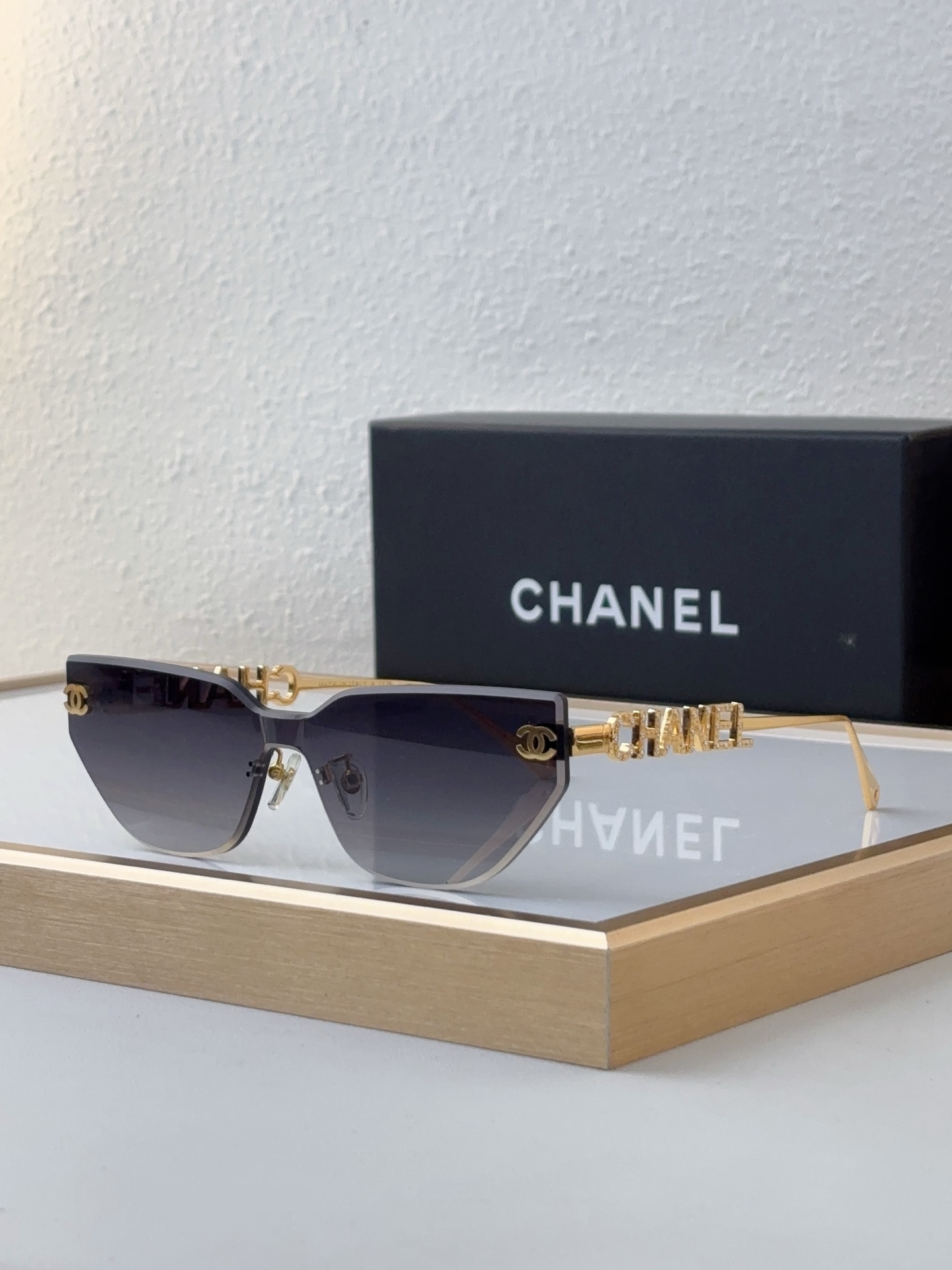 Chanel Silver - Tone Metal Shield - Shaped Sunglasses with Crystal - Embellished "CHANEL" & CC Motif (Model: CH5584)