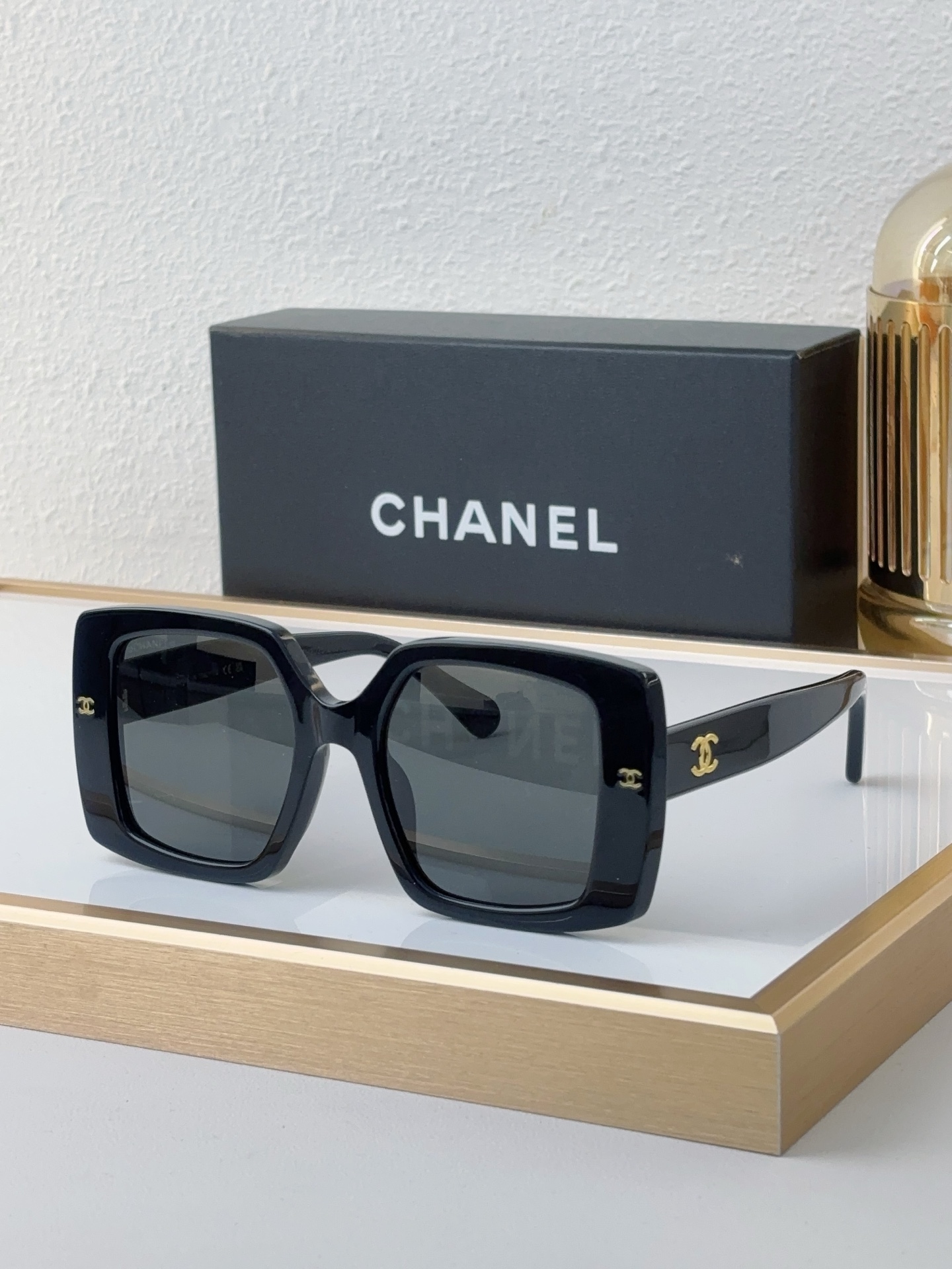 Chanel Black Acetate Square Sunglasses with Gold - Tone CC Motif (Model: CH5573)