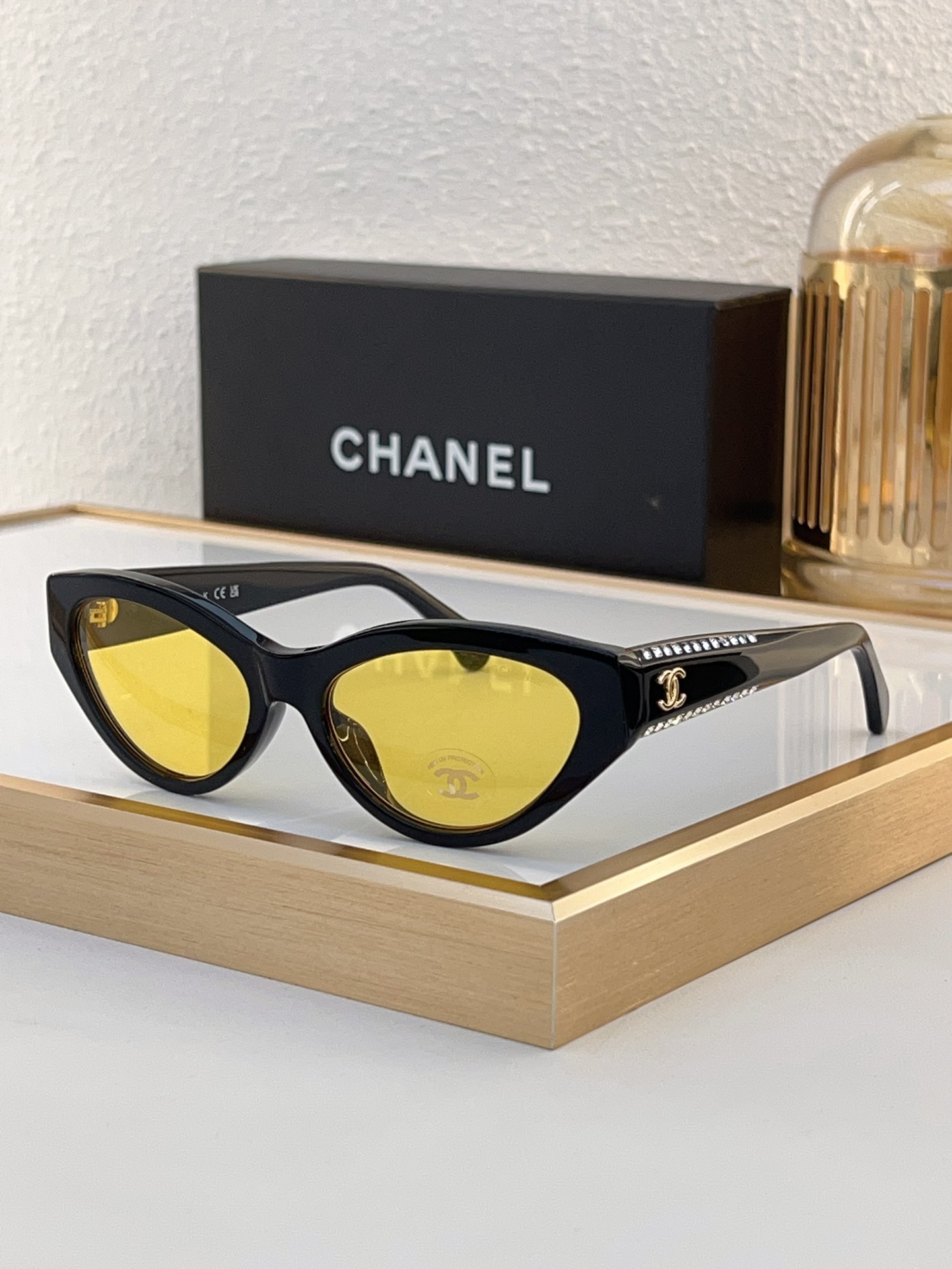 Chanel Black Acetate Cat - Eye Sunglasses with Gold CC Motif & Silver Accents (Model: CH5570)
