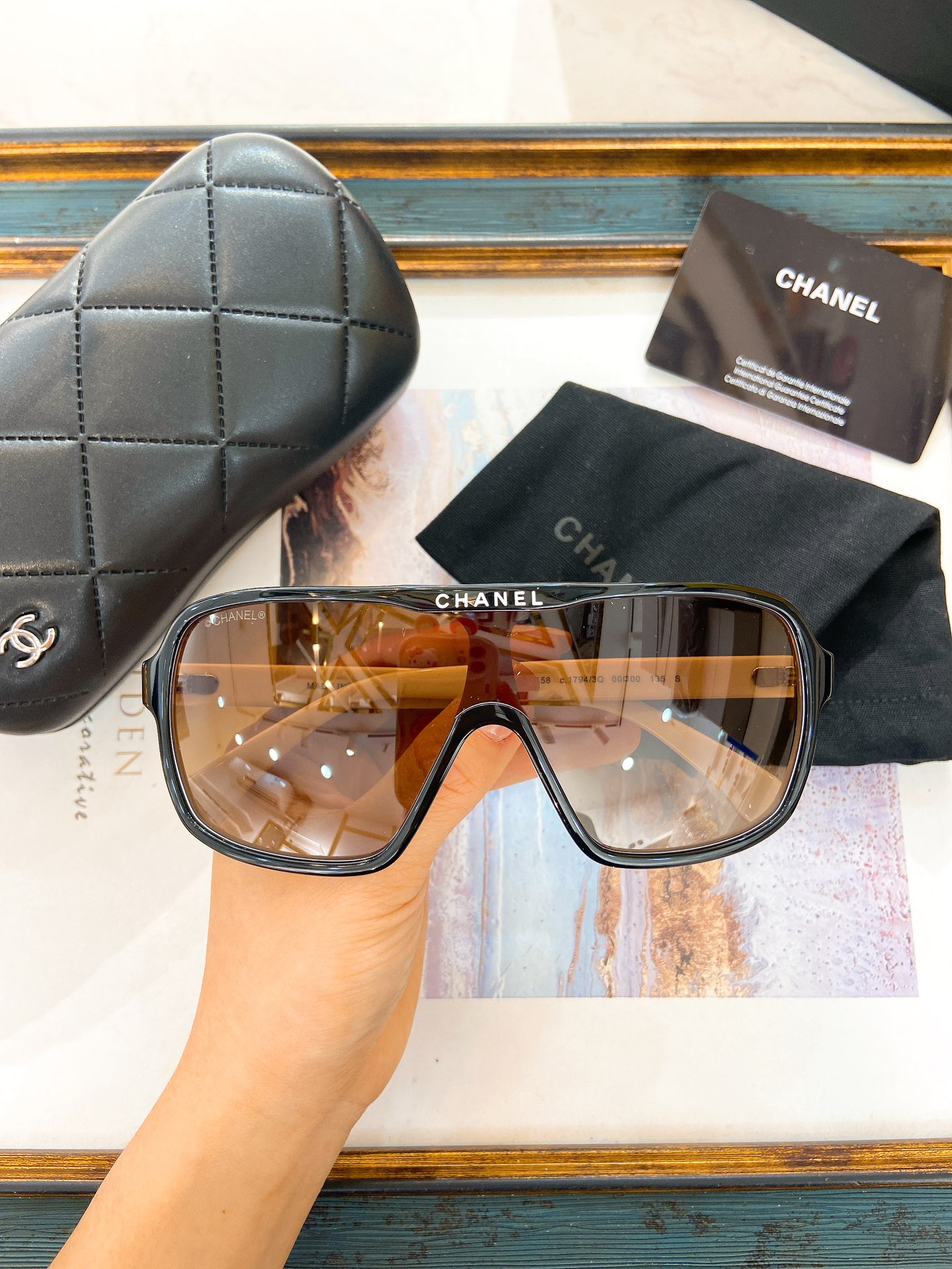 Chanel Black Acetate Shield - Shaped Sunglasses with Top Logo (Model: CH5567)