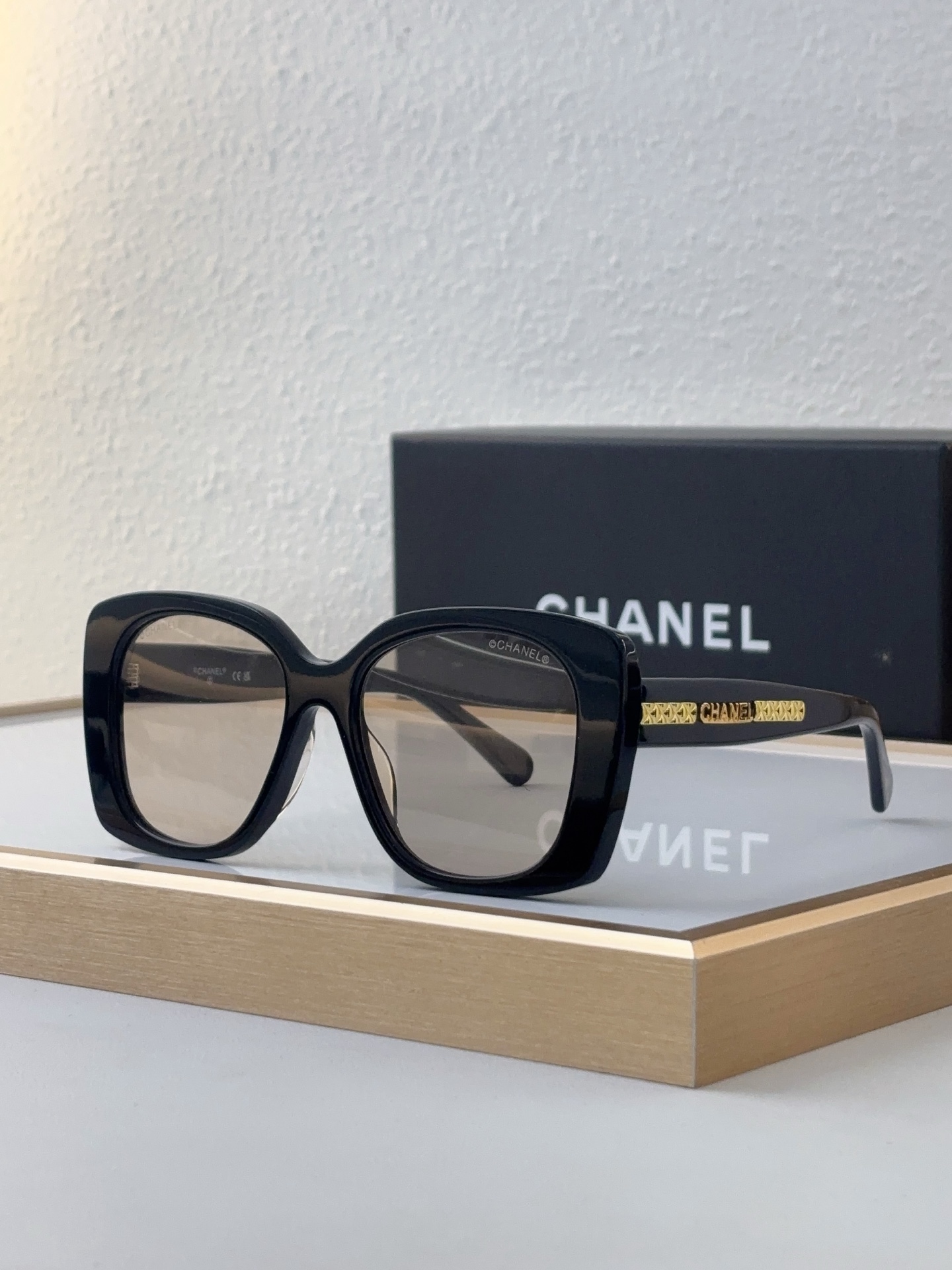 Chanel Black Acetate Square Sunglasses with Gold - Tone "CHANEL" Lettering (Model: CH5555)