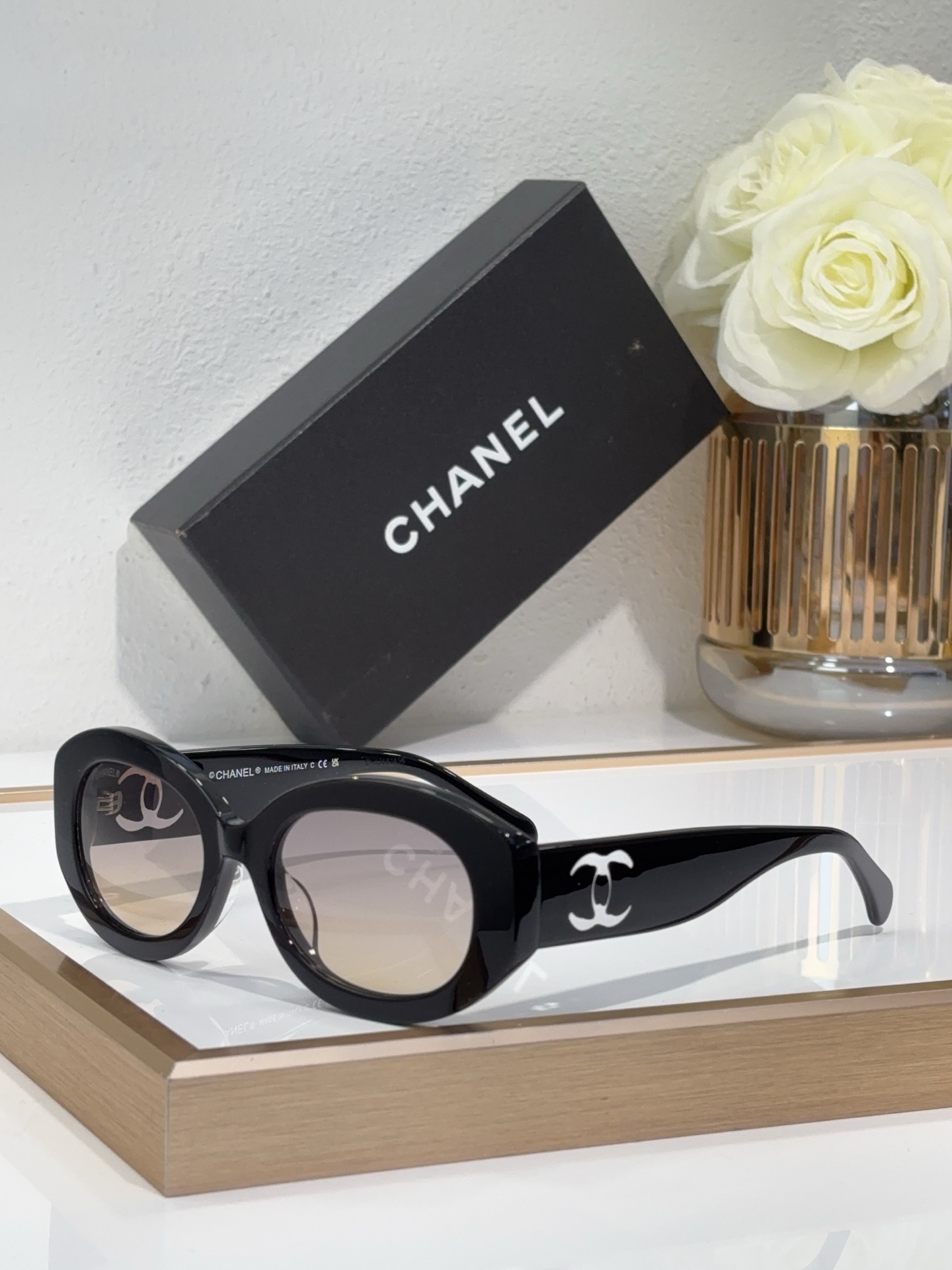 Chanel Black Acetate Oval Sunglasses with White CC Logos (Model: CH5527)