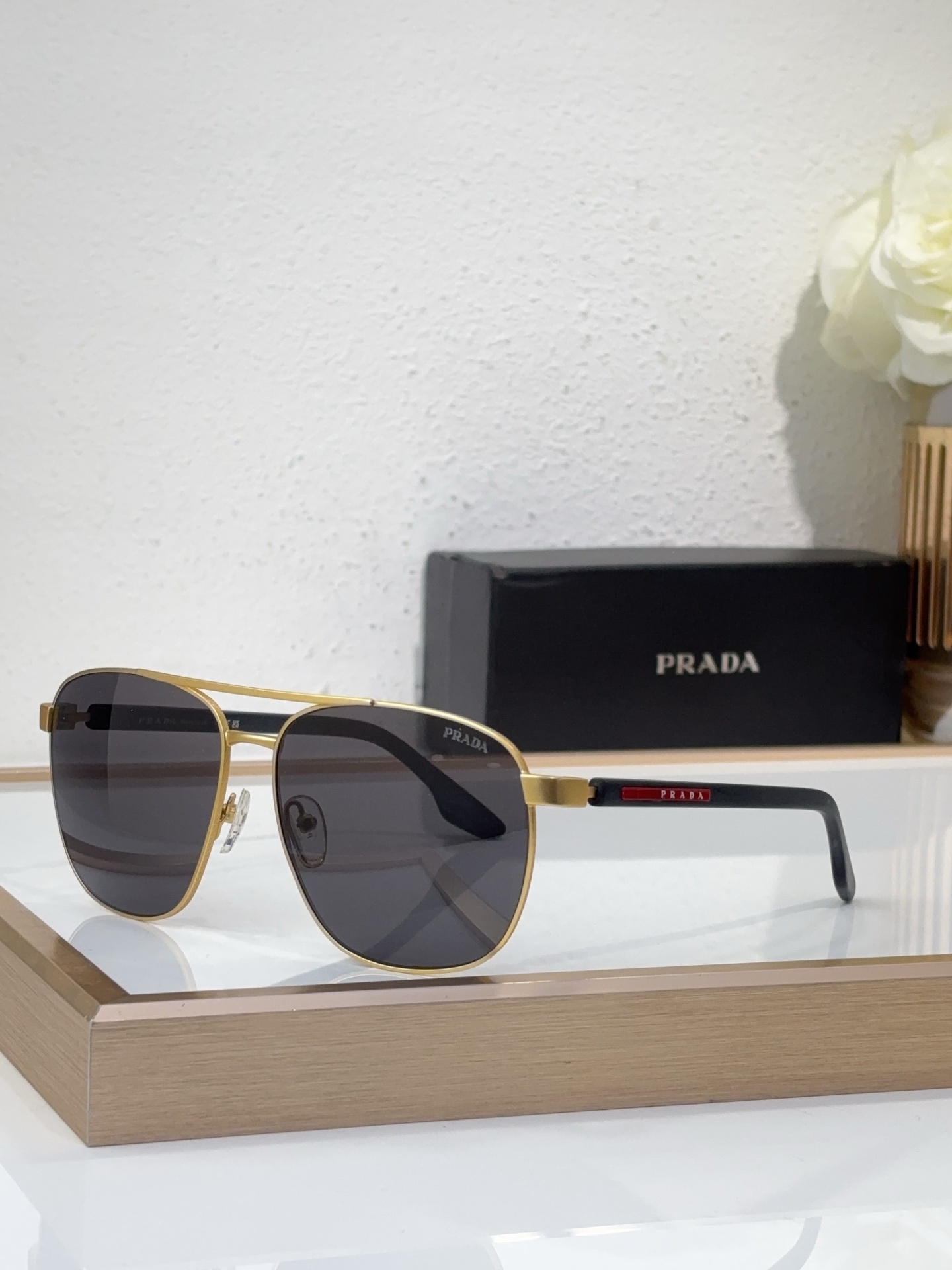 Prada Gold - Tone Metal Aviator Sunglasses with Red - Black Accents (Model: PR14003S)