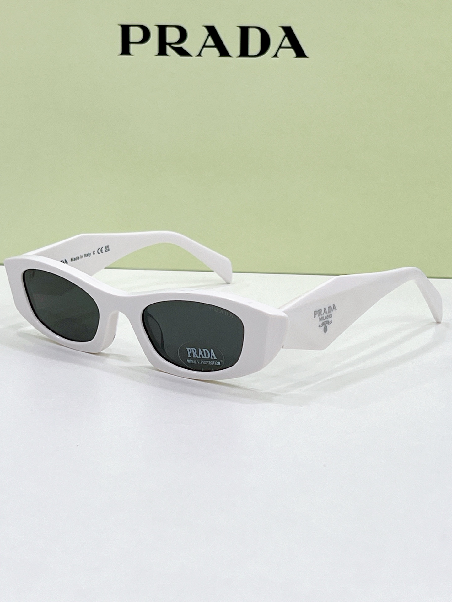 Prada White Acetate Cat - Eye Sunglasses (Model: PR12125S)