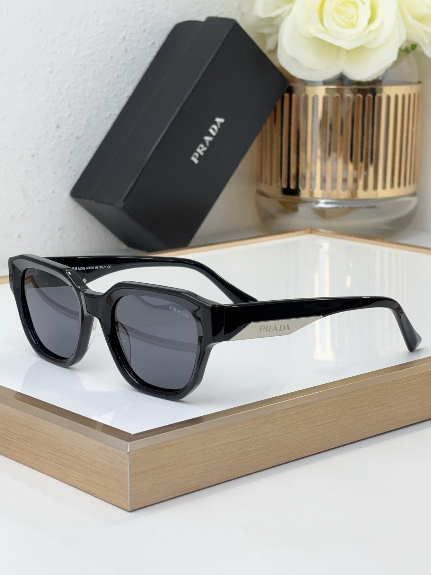 Prada Black Acetate Square Sunglasses with Silver Metal Accents (Model: PR10347S)