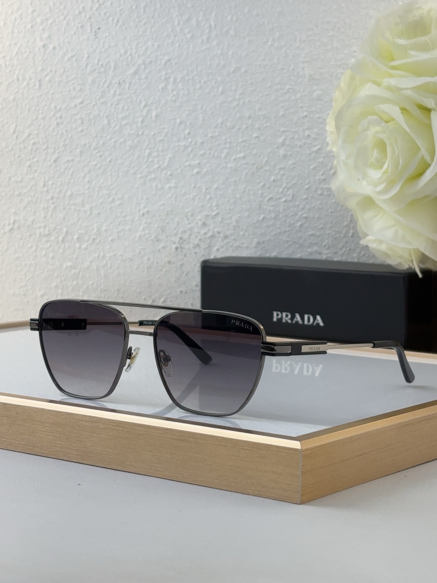 Prada Gunmetal - Tone Metal Aviator Sunglasses (Model: PR10236S)