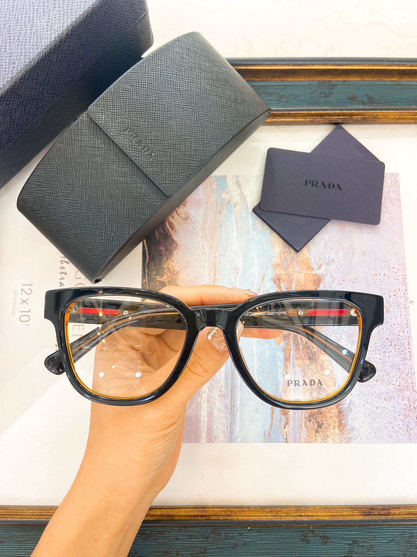 Prada Black Acetate Square Optical Glasses with Red & Gold Accents (Model: PR8125O)
