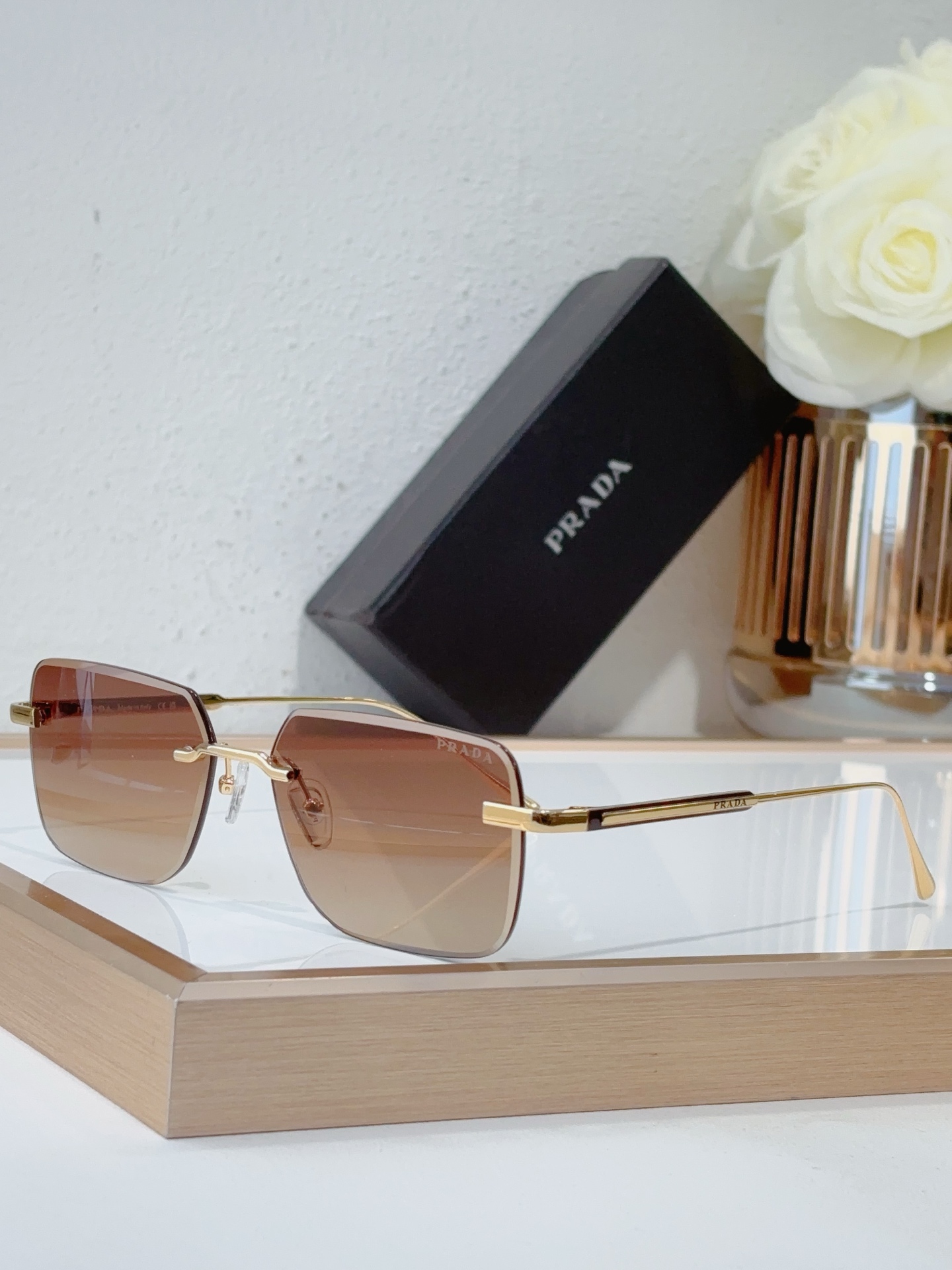 Prada Gold - Tone Metal Square Rimless Sunglasses (Model: PR6347S)