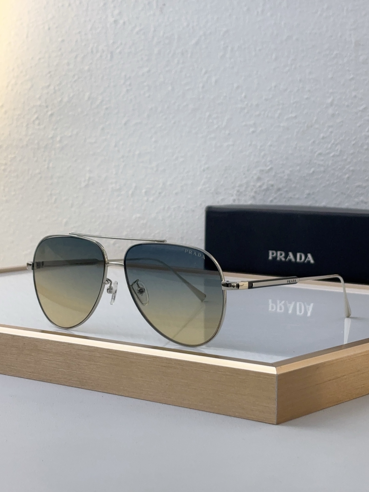 Prada Silver - Tone Metal Aviator Sunglasses with Gradient Lenses (Model: PR6014S)