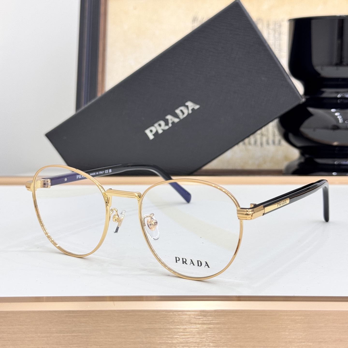 Prada Gold - Tone Metal Round Optical Glasses (Model: PR1122O)