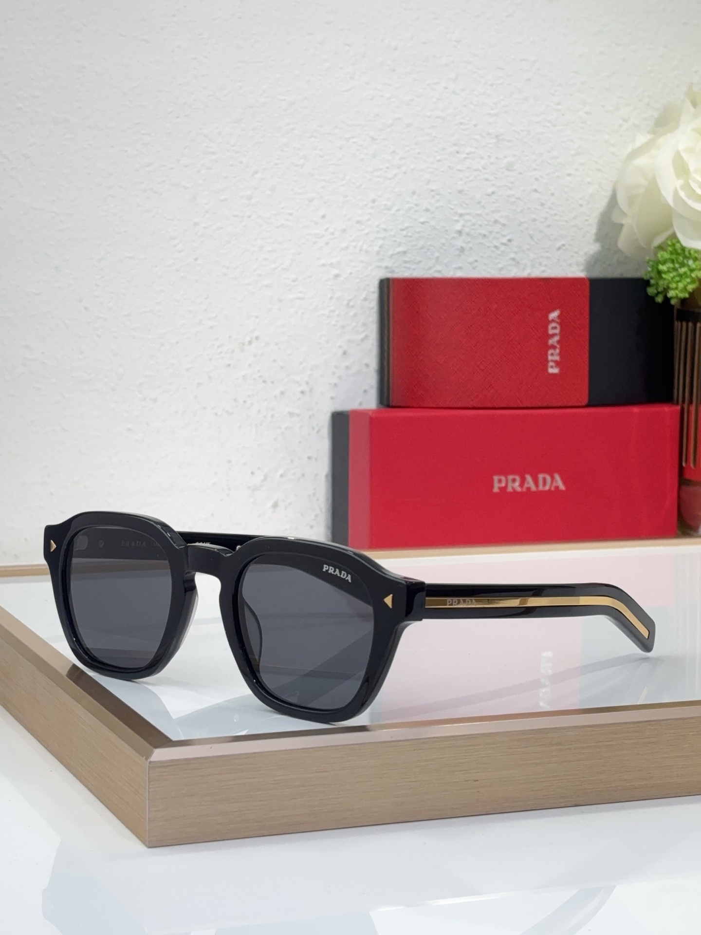 Prada Black Acetate Square Sunglasses with Gold Accents (Model: PR2222S)