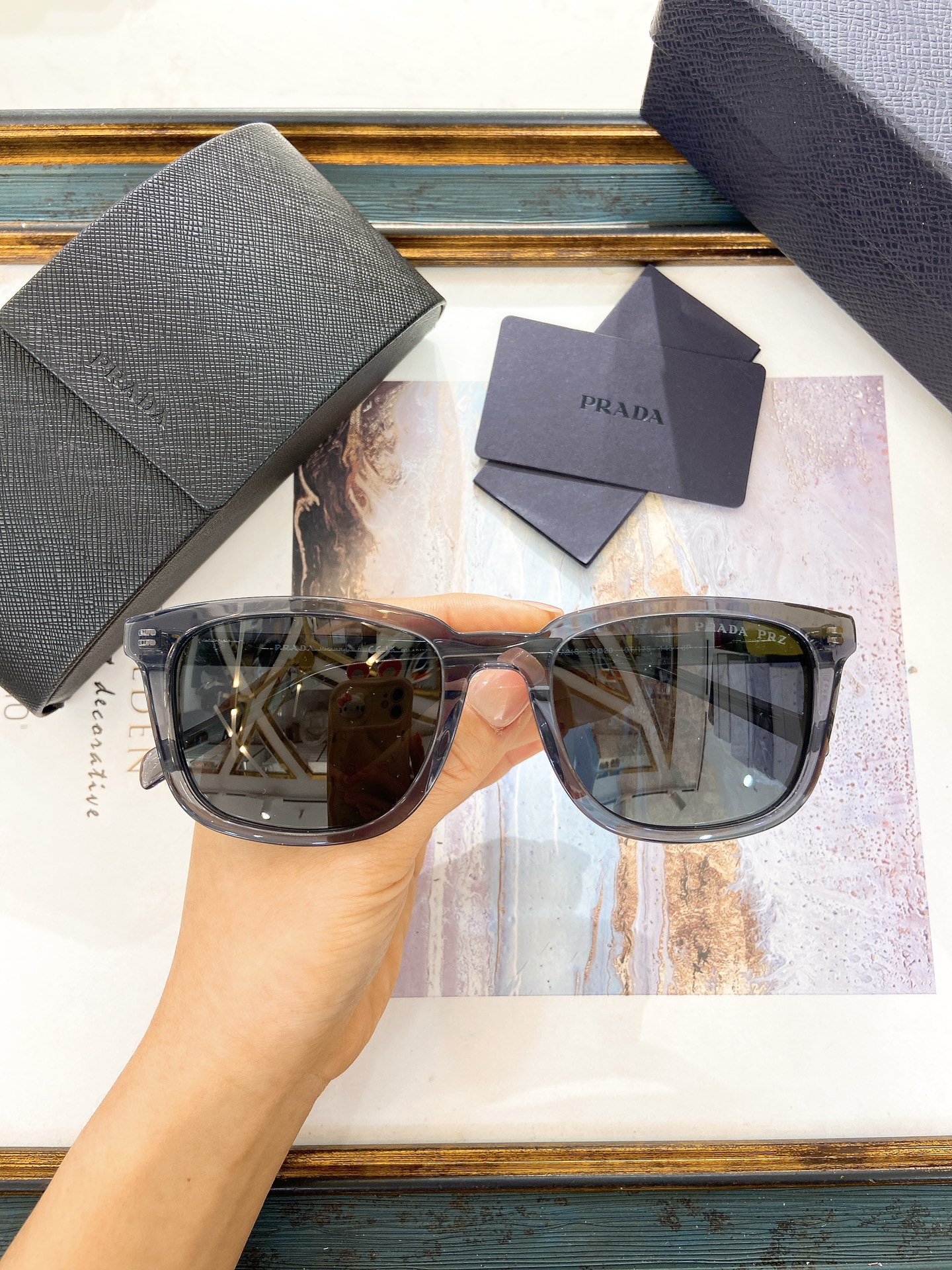 Prada Translucent Gray Acetate Square Sunglasses (Model: PR1234S)