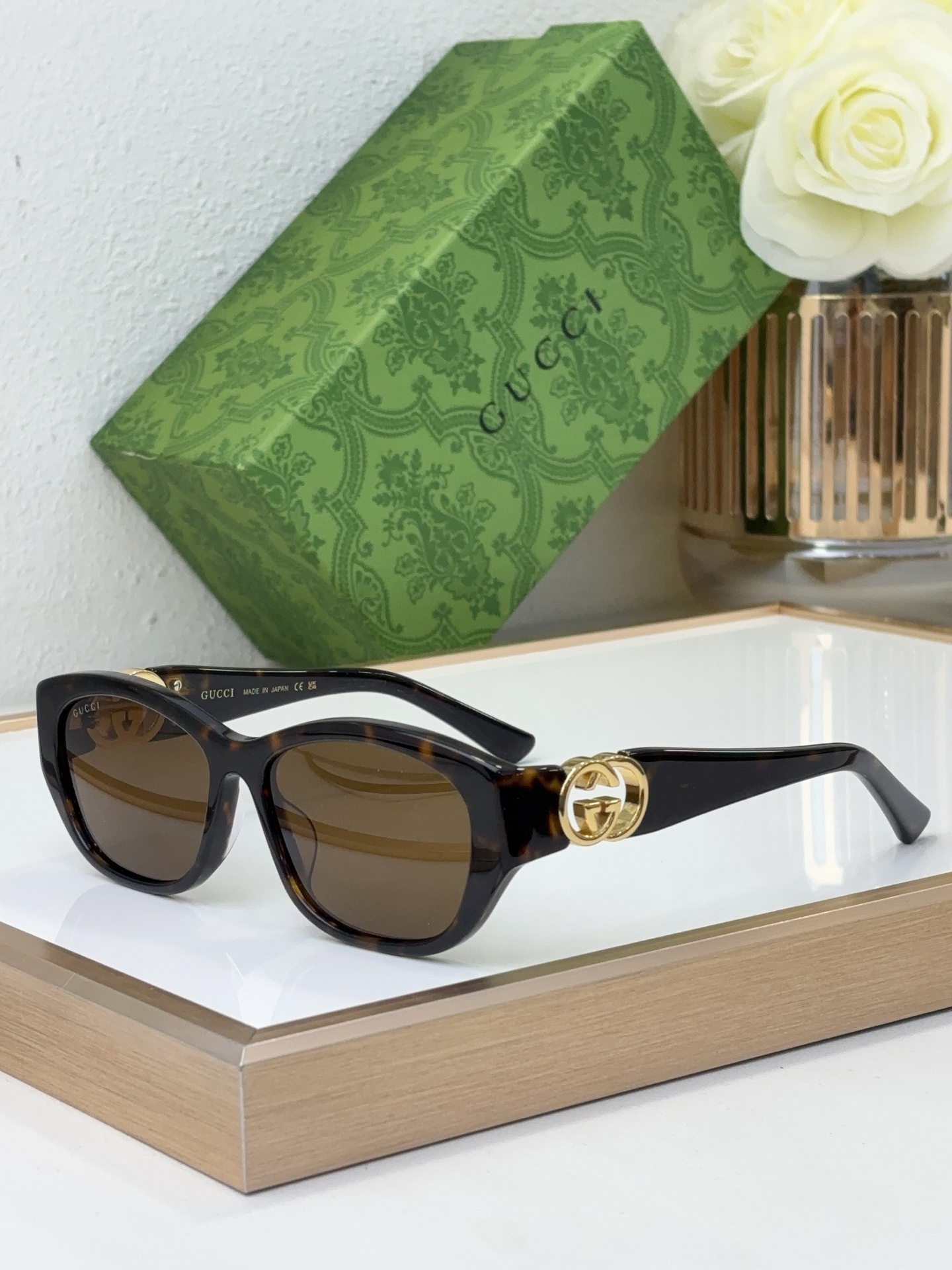 Gucci Oval - cat - eye tortoise - effect acetate sunglasses with gold - tone Double G accents & brown lenses (Model: GG1284S)