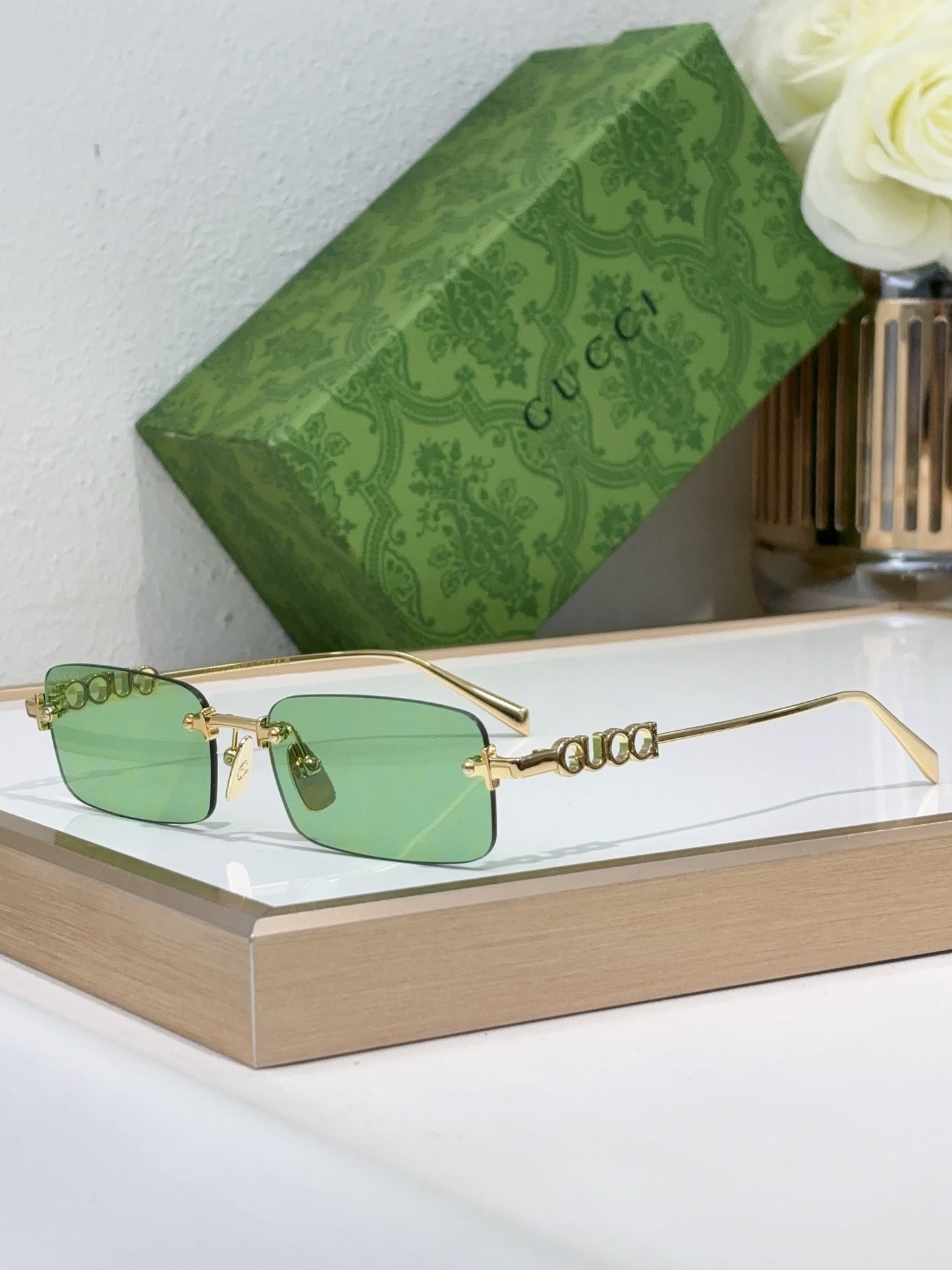 Gucci Rimless Rectangular Gold - Tone Metal Sunglasses with Interlocking G Temple Accents & Green Lenses (Model: GG1282S)