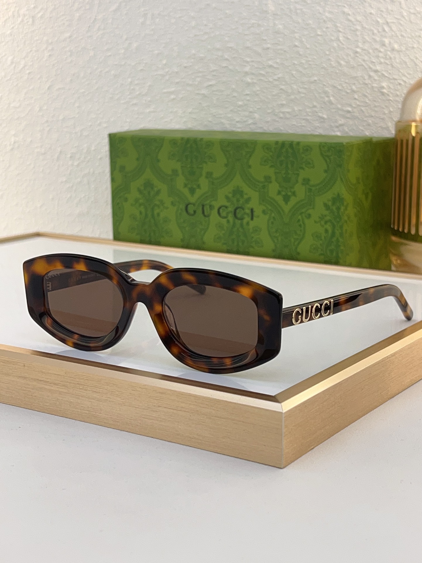 Gucci Cat - Eye Black Acetate Sunglasses with Gold - Tone "GUCCI" Temple Accents & Gray Lenses (Model: GG1256S)