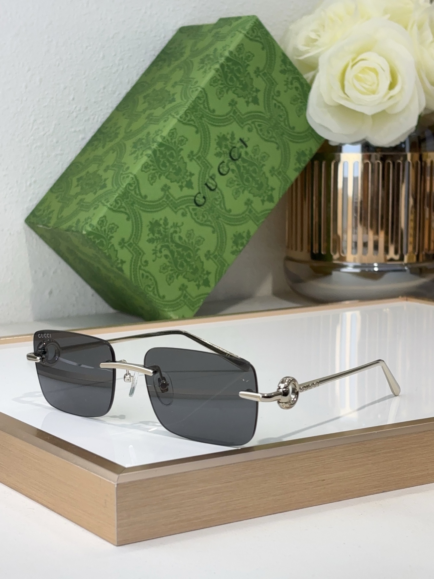 Gucci Square Rimless Silver - Tone Metal Sunglasses with Chain - Linked Temple Accents & Gray Lenses (Model: GG1252S)