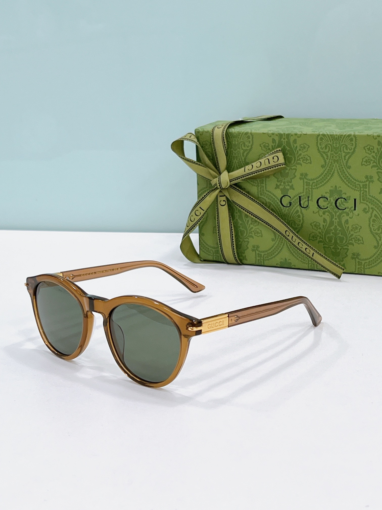 Gucci Round Acetate Sunglasses with Gold Accents & Gray Lenses - GG1310S