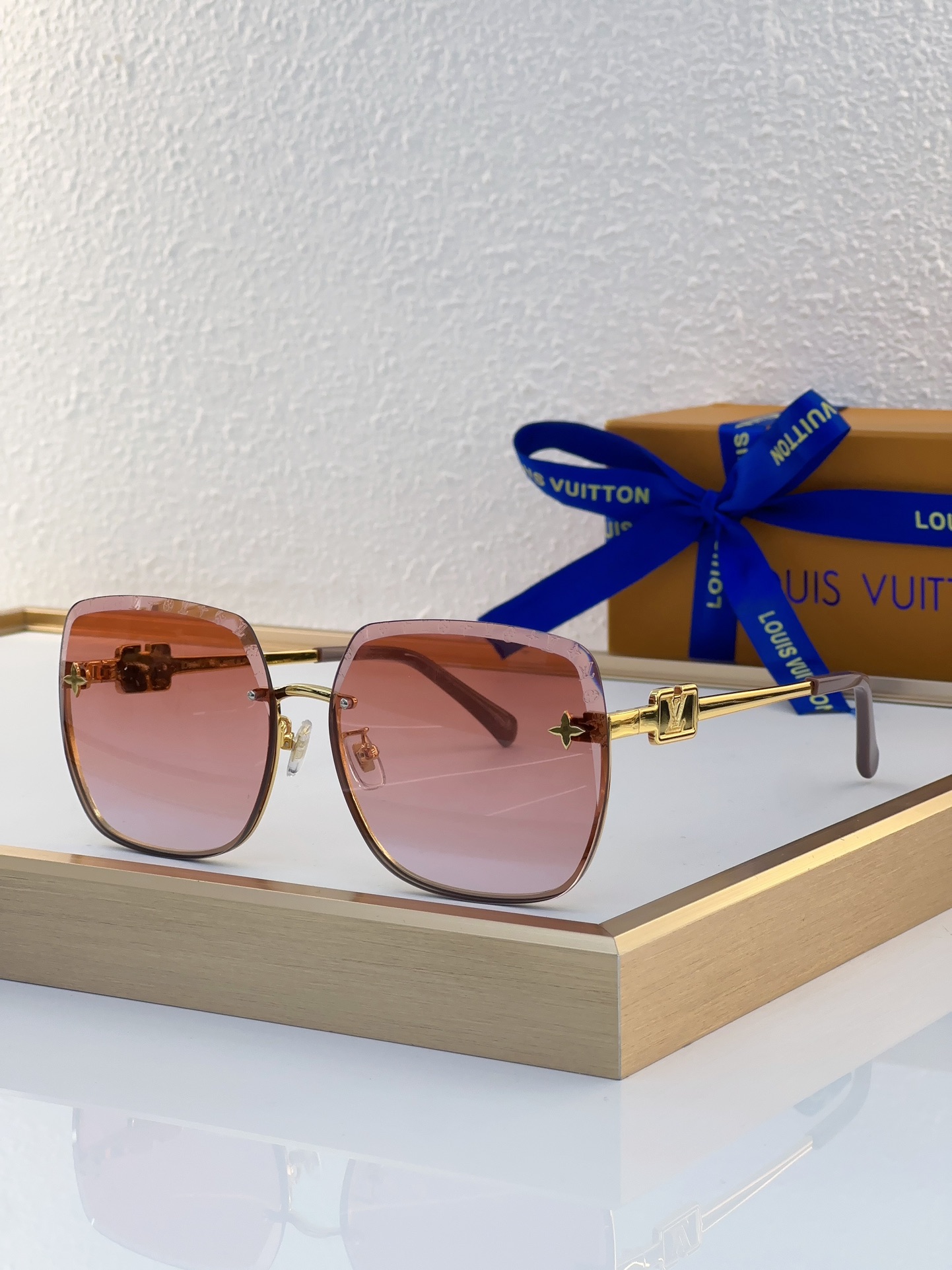 Louis Vuitton Oversized Square Metal Sunglasses with Gradient Brown Lenses, Gold - Tone Frame, Orange Accents & Star Motifs - Z1822E