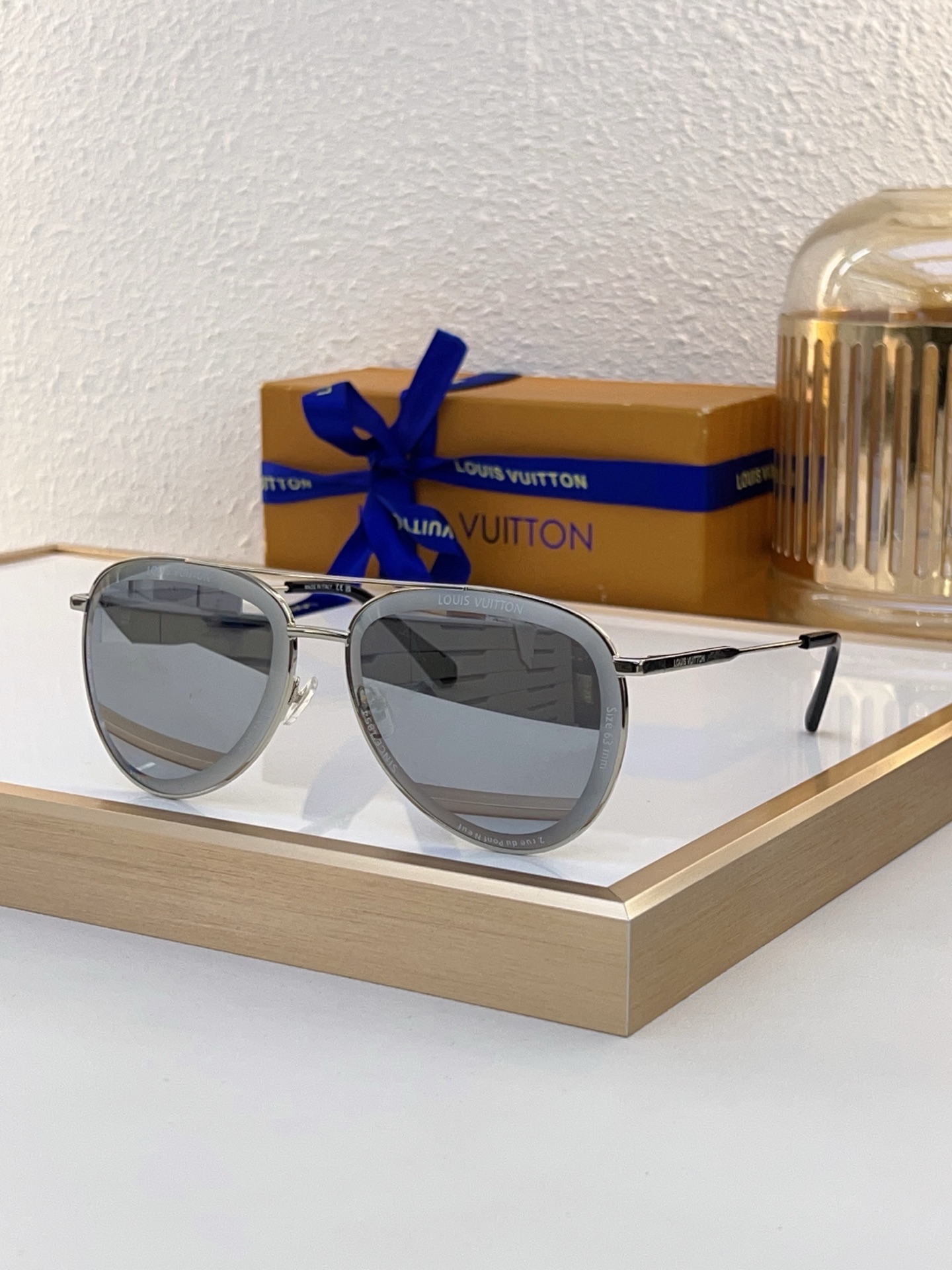 Louis Vuitton Round Metal Sunglasses with Gold - Tone Frame, Gradient Blue Lenses & Signature Detailing - Z1800E