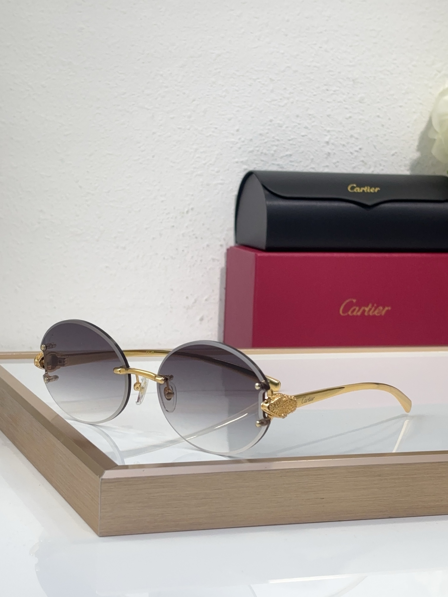 Cartier CT0694S Rimless Round Sunglasses