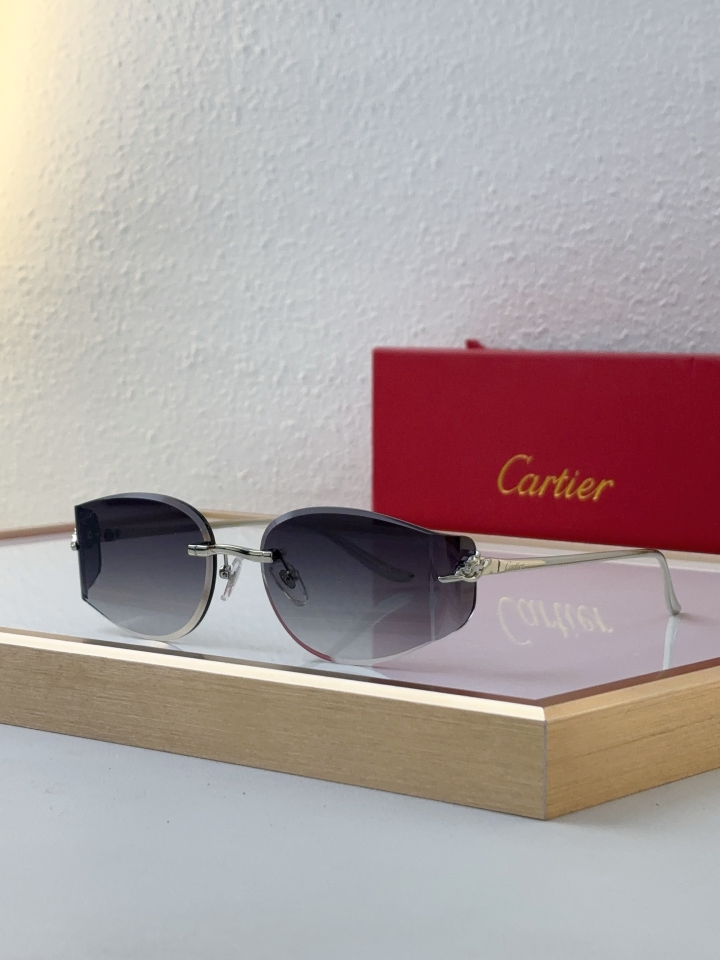 Cartier CT0641S Rimless Oval Sunglasses
