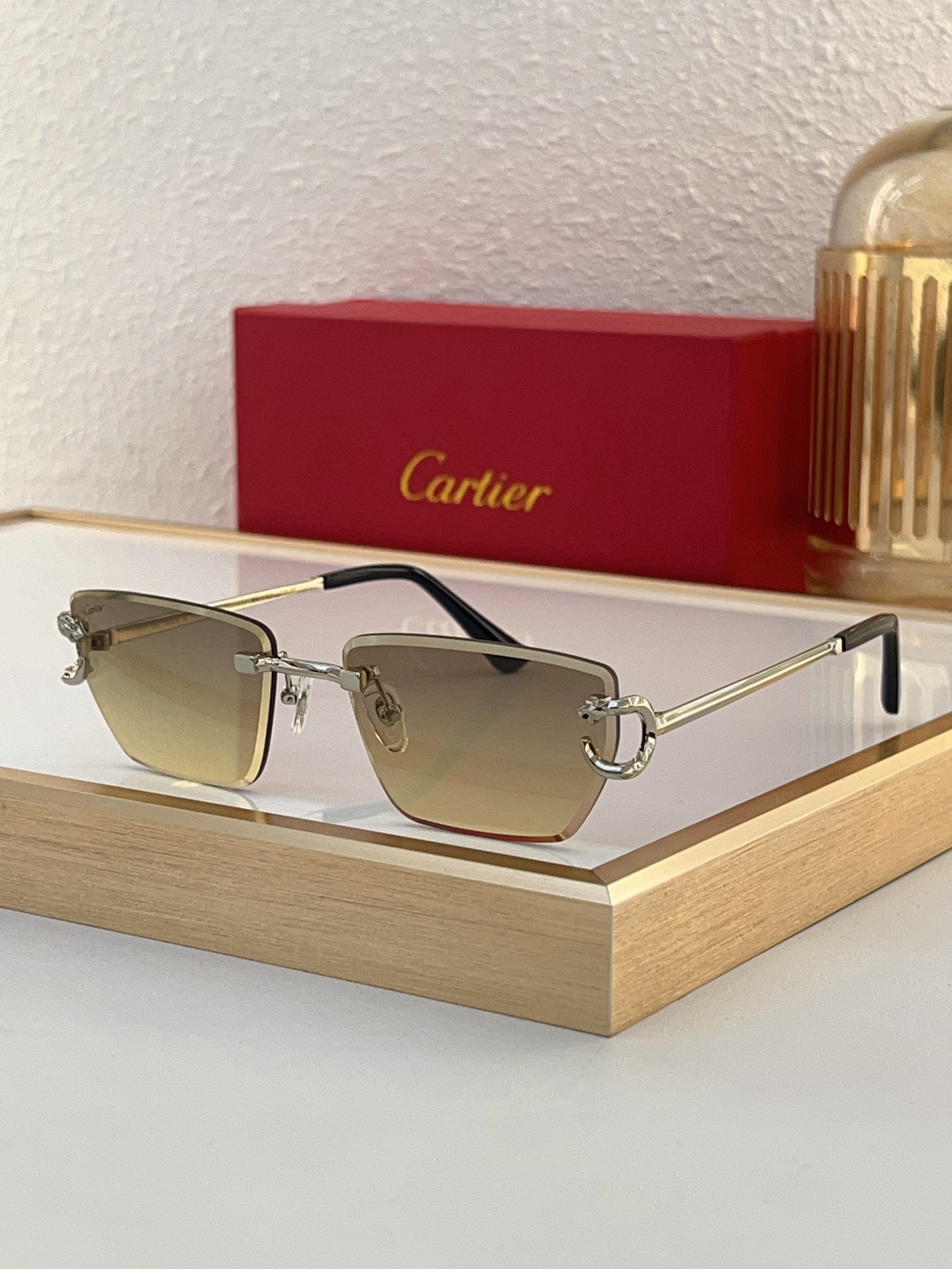 Cartier CT0633S Rimless Square Sunglasses with Gold Ornamental Accents