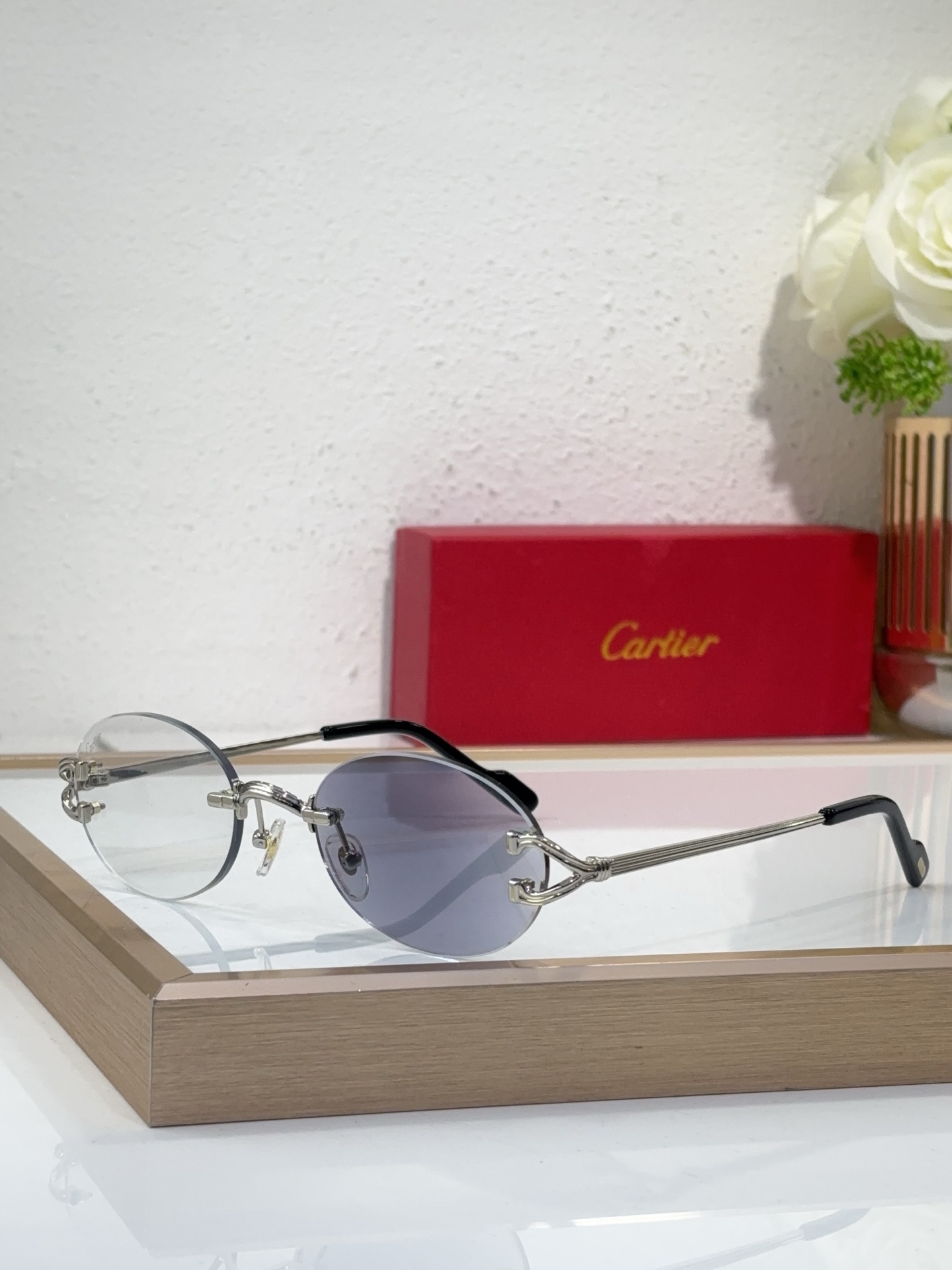 Cartier CT0057S Oval - Shaped Rimless Sunglasses