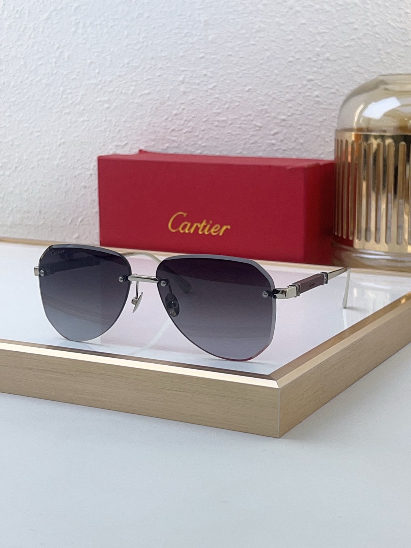 Cartier CT0348S Aviator - Style Rimless Sunglasses