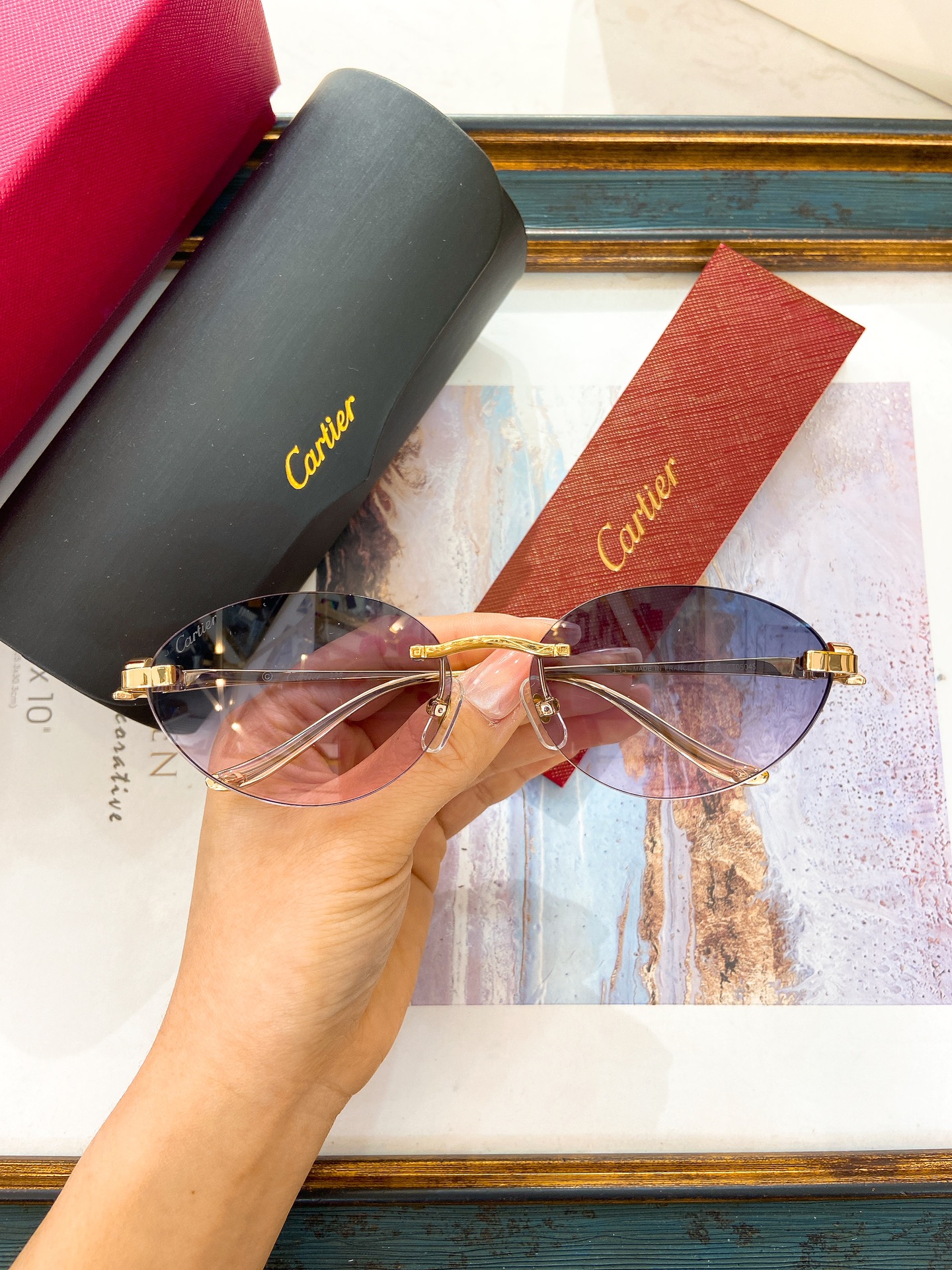 Cartier CT0290S Rimless Oval Sunglasses