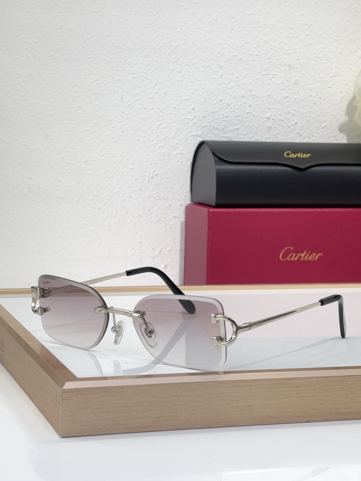 Cartier CT0092O Rectangular Rimless Sunglasses