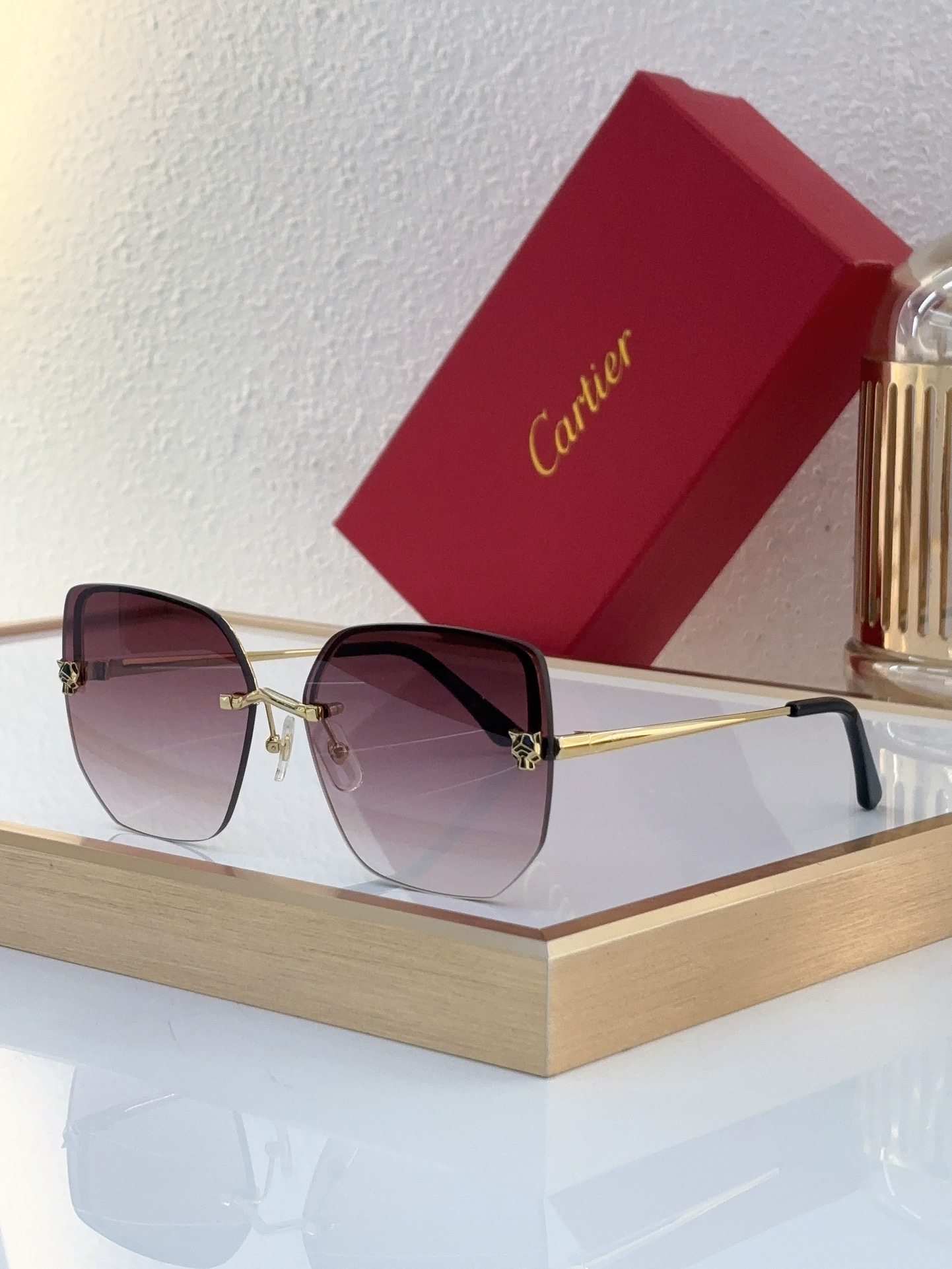 Cartier CT0432S Panther Motif Geometric Rimless Sunglasses