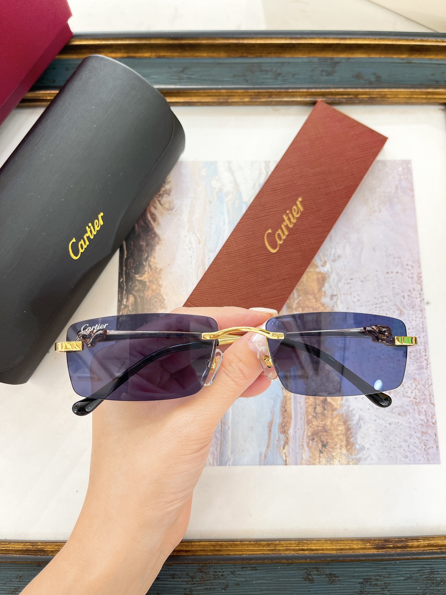 Cartier CT0430S Panther Motif Rectangular Rimless Sunglasses