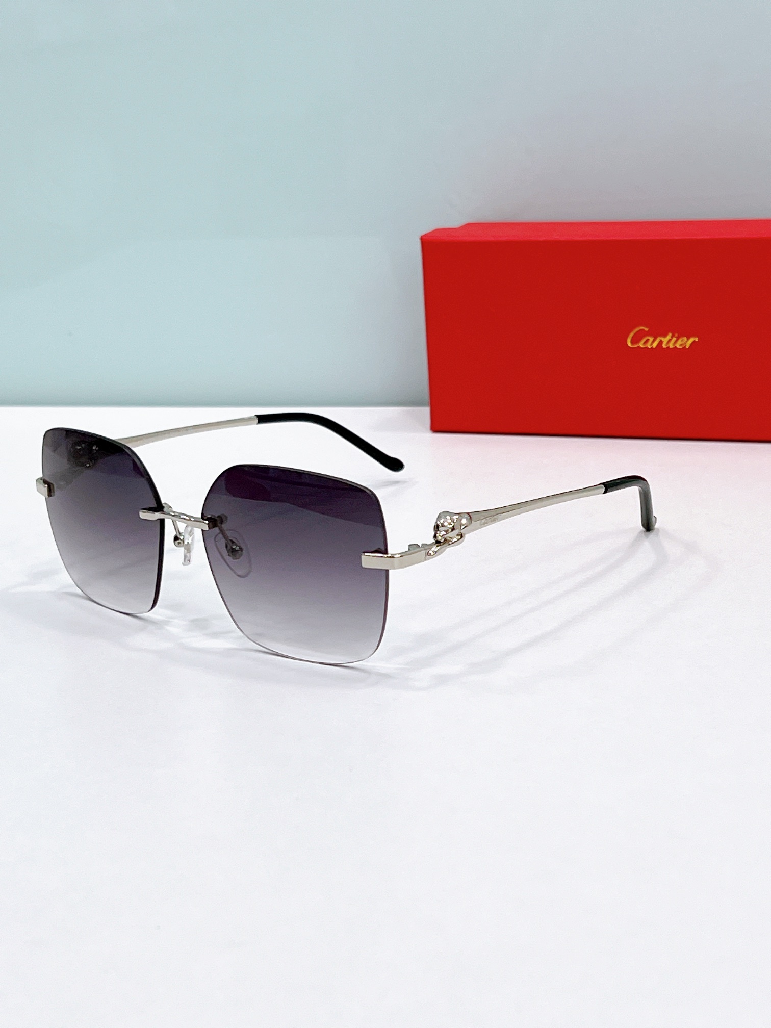 Cartier CT0359S Panther Temple Décor Rimless Square Sunglasses