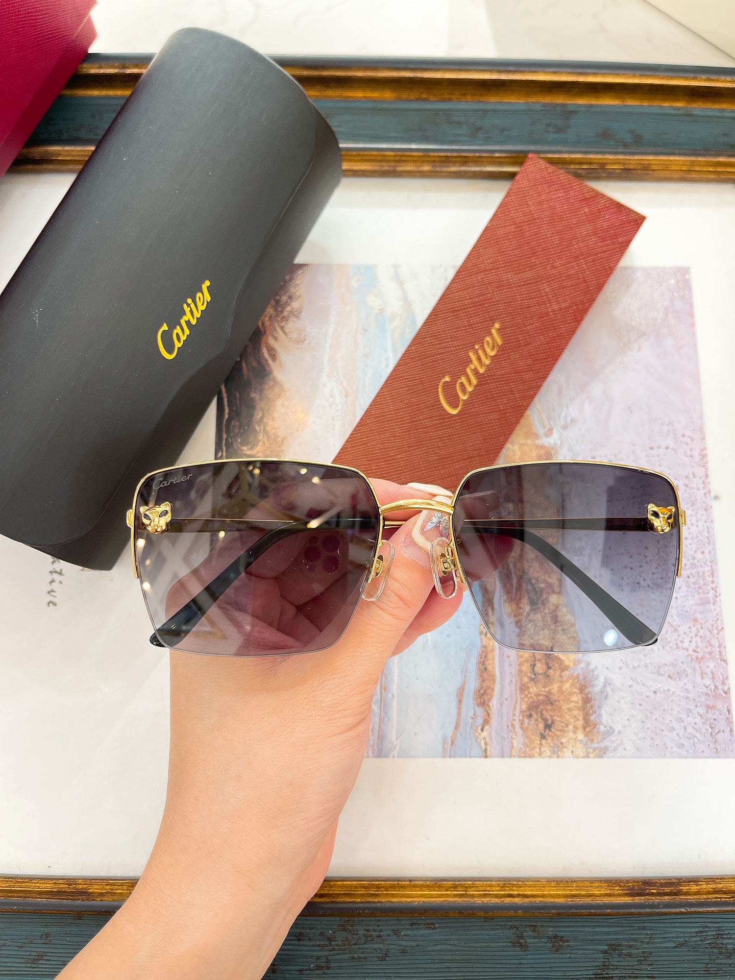 Cartier CT0333S Panther Décor Rectangular Rimless Sunglasses