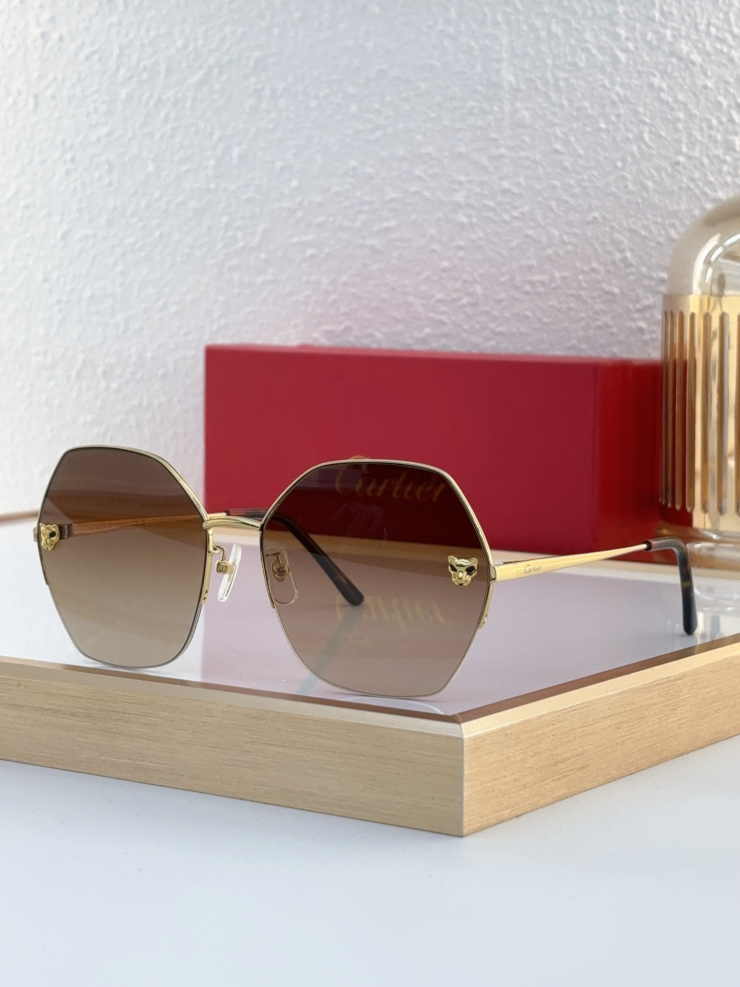 Cartier CT0332S Panther Décor Rimless Geometric Sunglasses