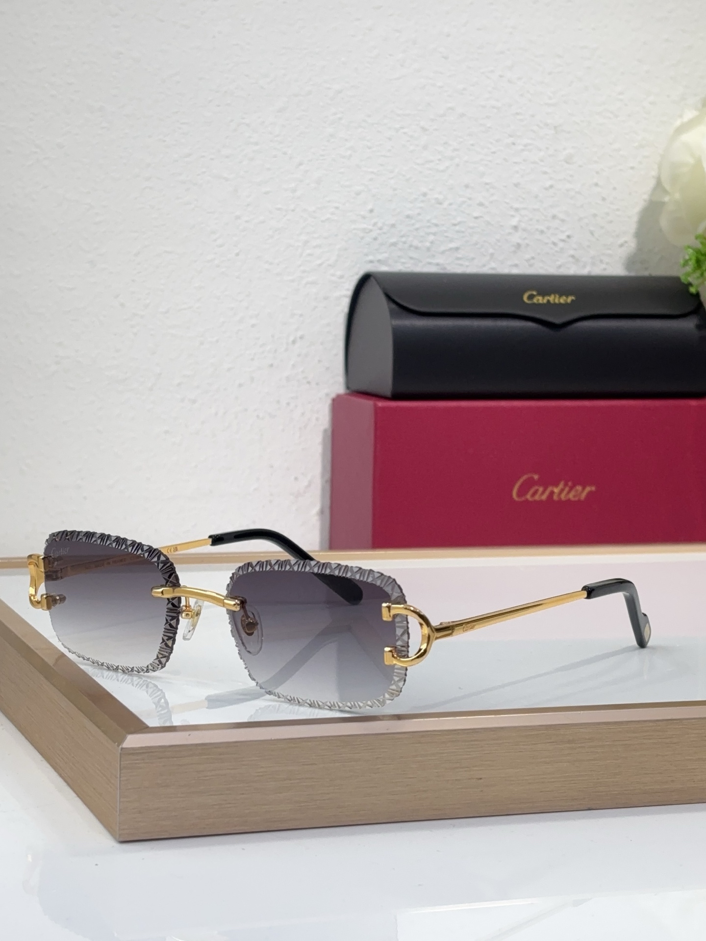 Cartier CT0696S Diamond-Cut Grey Gradient Rimless Sunglasses