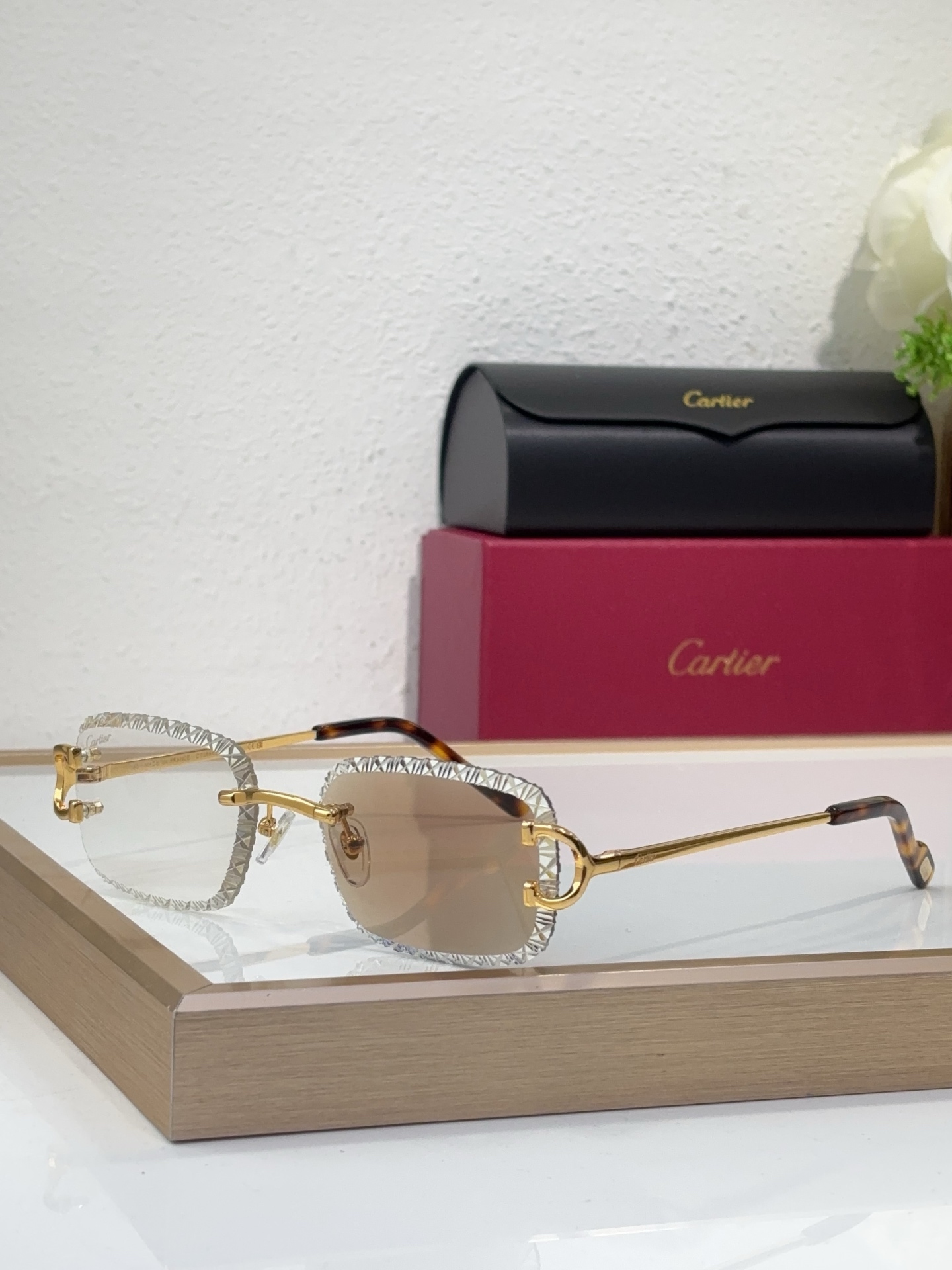 Cartier CT0696S Geometric-Engraved Rimless Sunglasses