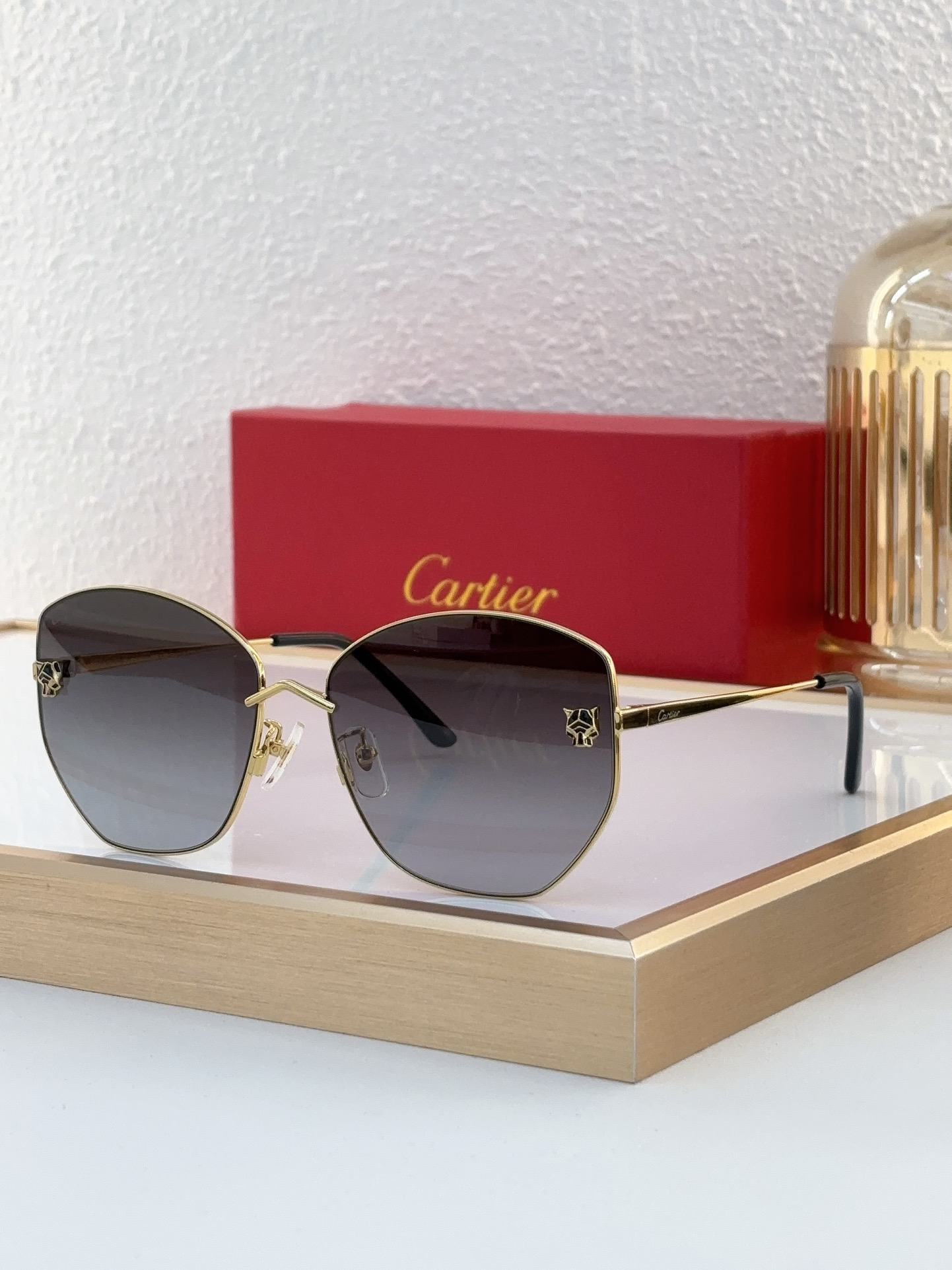 Cartier CT0271S Gold-Tone Panther Emblem Rimless Sunglasses