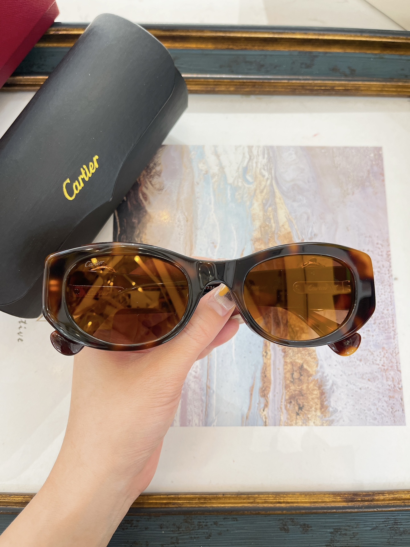 Cartier CT0473S Oval Black Acetate Sunglasses